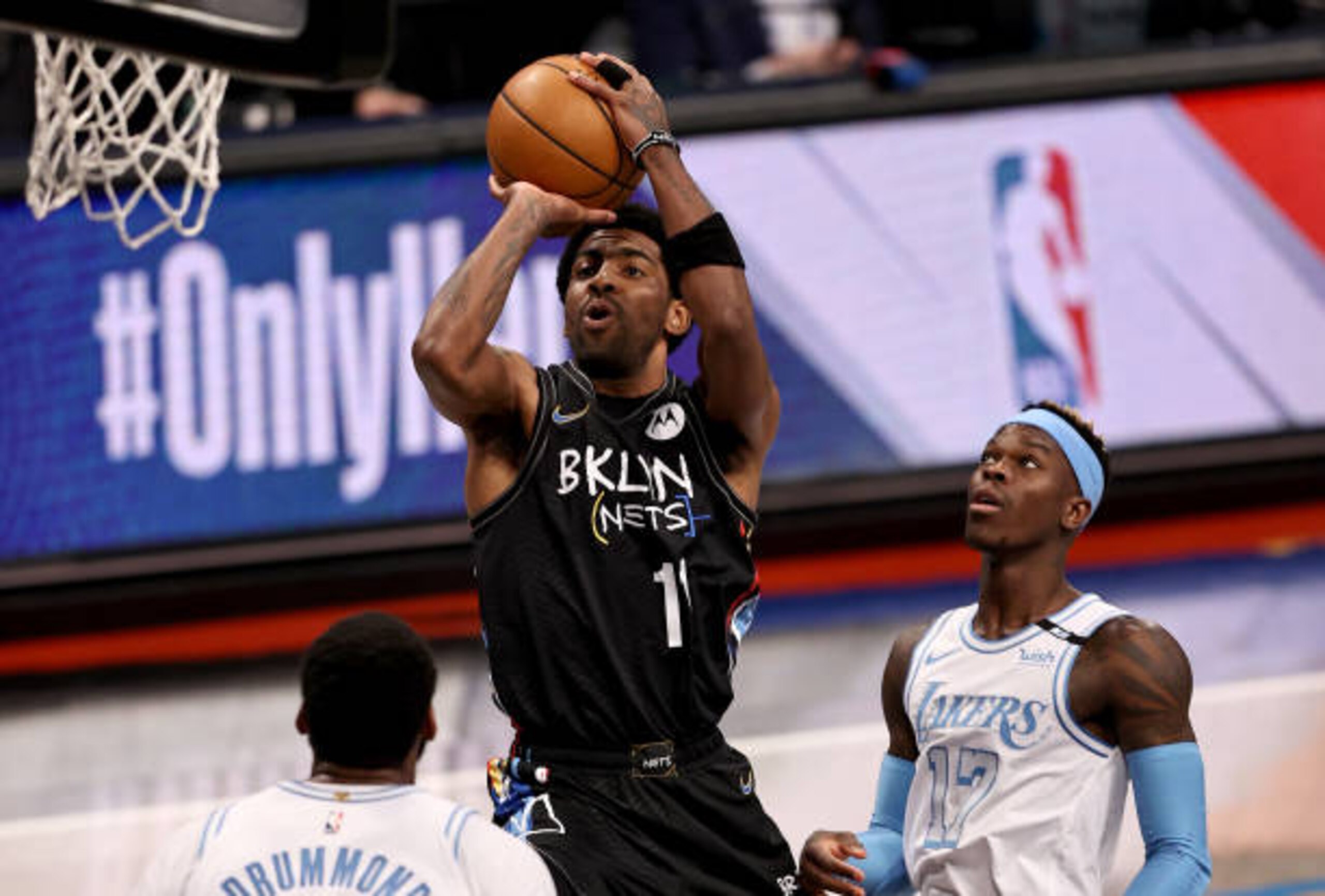 NEW YORK, NEW YORK - APRIL 10: Kyrie Irving #11 of the Brooklyn Nets takes a shot as Andre Drummond #2 and Dennis Schroder #17 of the Los Angeles Lakers defend in the first quarter at Barclays Center on April 10, 2021 in the Brooklyn borough of New York City.NOTE TO USER: User expressly acknowledges and agrees that, by downloading and or using this photograph, User is consenting to the terms and conditions of the Getty Images License Agreement. (Photo by Elsa/Getty Images) NEW YORK, NEW YORK - APRIL 10: Kyrie Irving #11 of the Brooklyn Nets takes a shot as Andre Drummond #2 and Dennis Schroder #17 of the Los Angeles Lakers defend in the first quarter at Barclays Center on April 10, 2021 in the Brooklyn borough of New York City.NOTE TO USER: User expressly acknowledges and agrees that, by downloading and or using this photograph, User is consenting to the terms and conditions of the Getty Images License Agreement. (Photo by Elsa/Getty Images)
