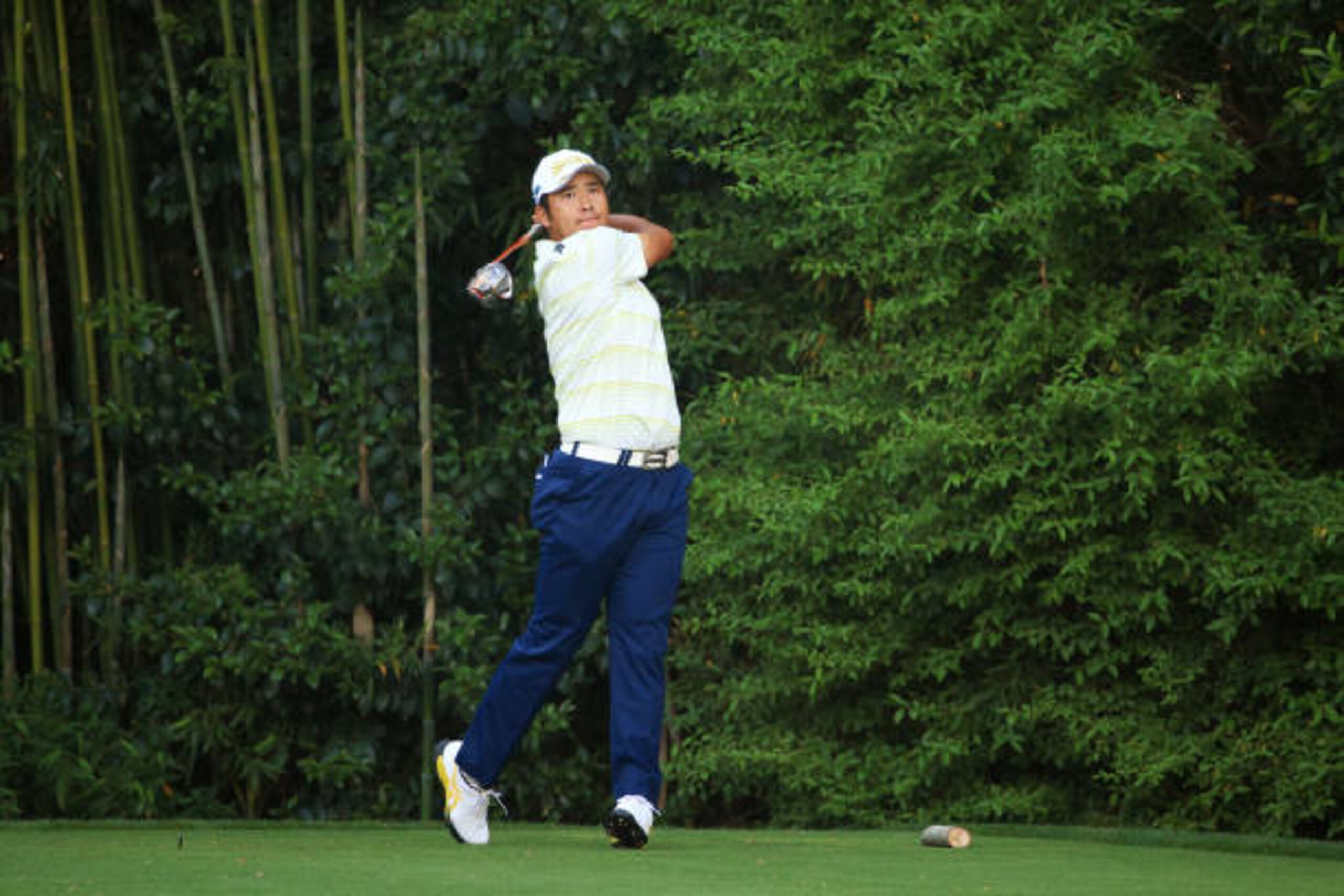 AUGUSTA, GEORGIA - APRIL 11: Hideki Matsuyama of Japan plays his shot from the 14th tee during the final round of the Masters at Augusta National Golf Club on April 11, 2021 in Augusta, Georgia. (Photo by Mike Ehrmann/Getty Images)