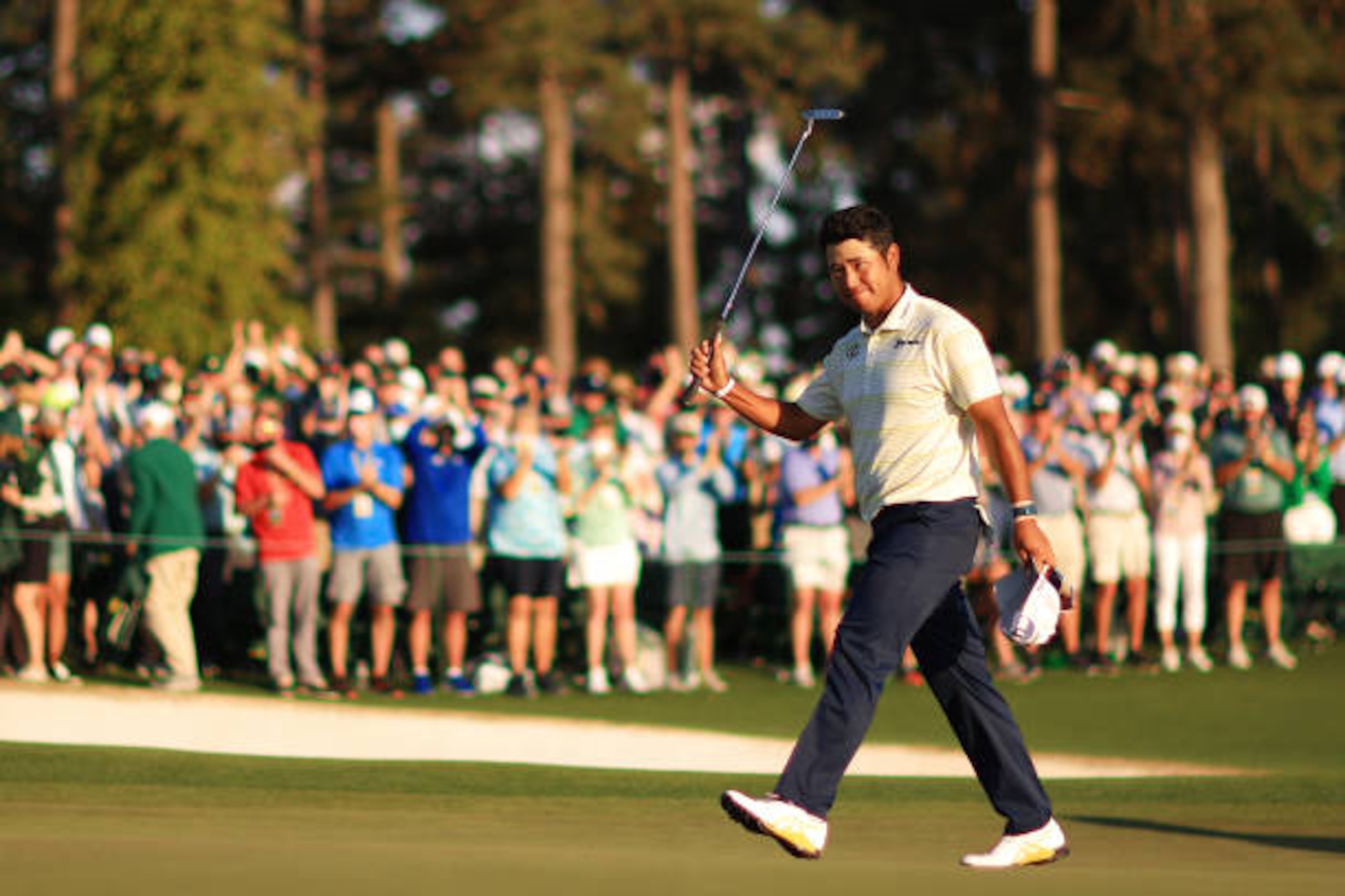 AUGUSTA, GEORGIA - APRIL 11: Hideki Matsuyama of Japan celebrates on the 18th green after winning the Masters at Augusta National Golf Club on April 11, 2021 in Augusta, Georgia. (Photo by Mike Ehrmann/Getty Images)
