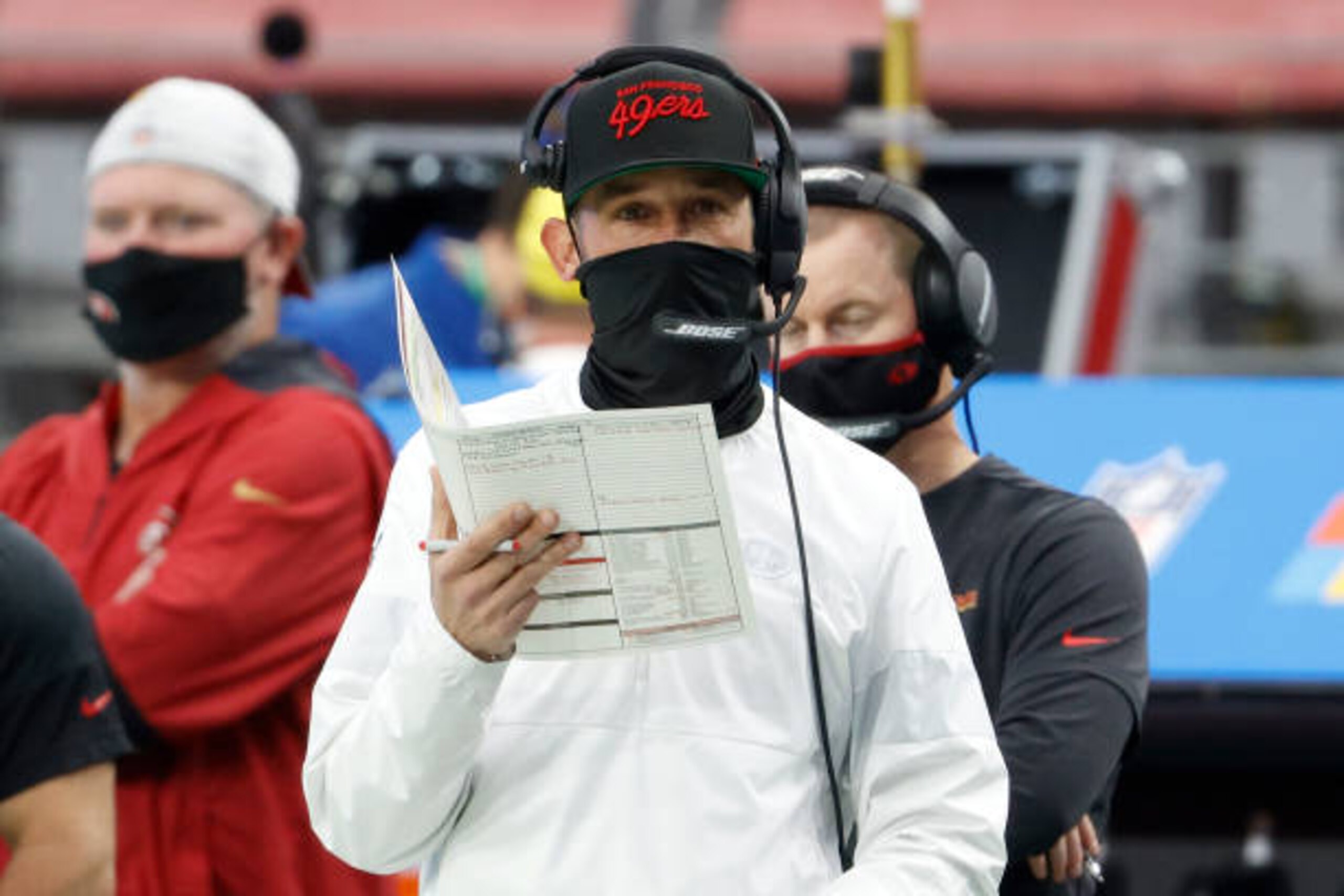GLENDALE, ARIZONA - DECEMBER 13: Head coach Kyle Shanahan of the San Francisco 49ers looks on during the first quarter of the game against the Washington Football Team at State Farm Stadium on December 13, 2020 in Glendale, Arizona.  (Photo by Christian Petersen/Getty Images)