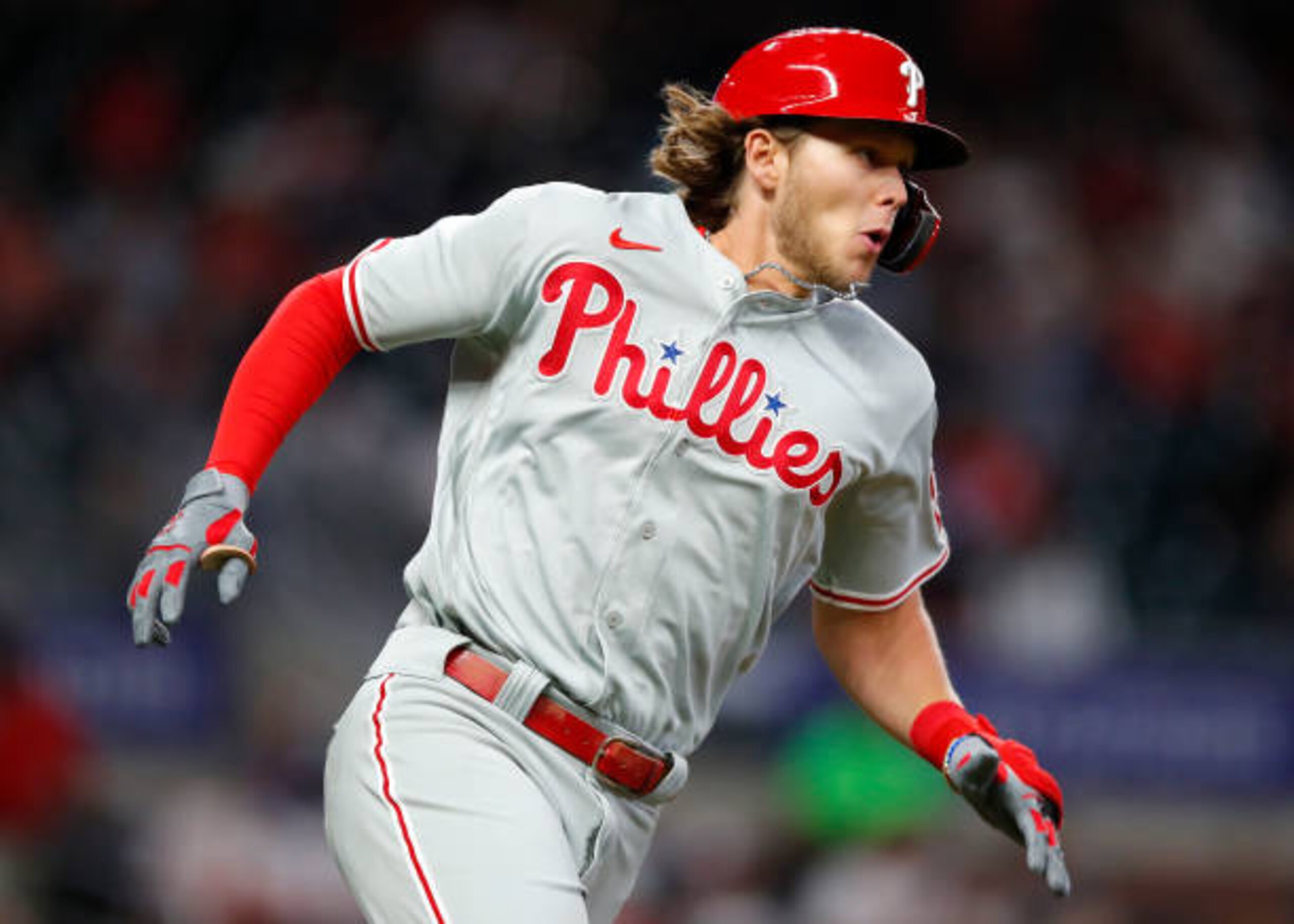 ATLANTA, GA - APRIL 11: Alec Bohm #28 of the Philadelphia Phillies runs the bases on his double in the ninth inning against the Atlanta Braves at Truist Park on April 11, 2021 in Atlanta, Georgia. (Photo by Todd Kirkland/Getty Images)