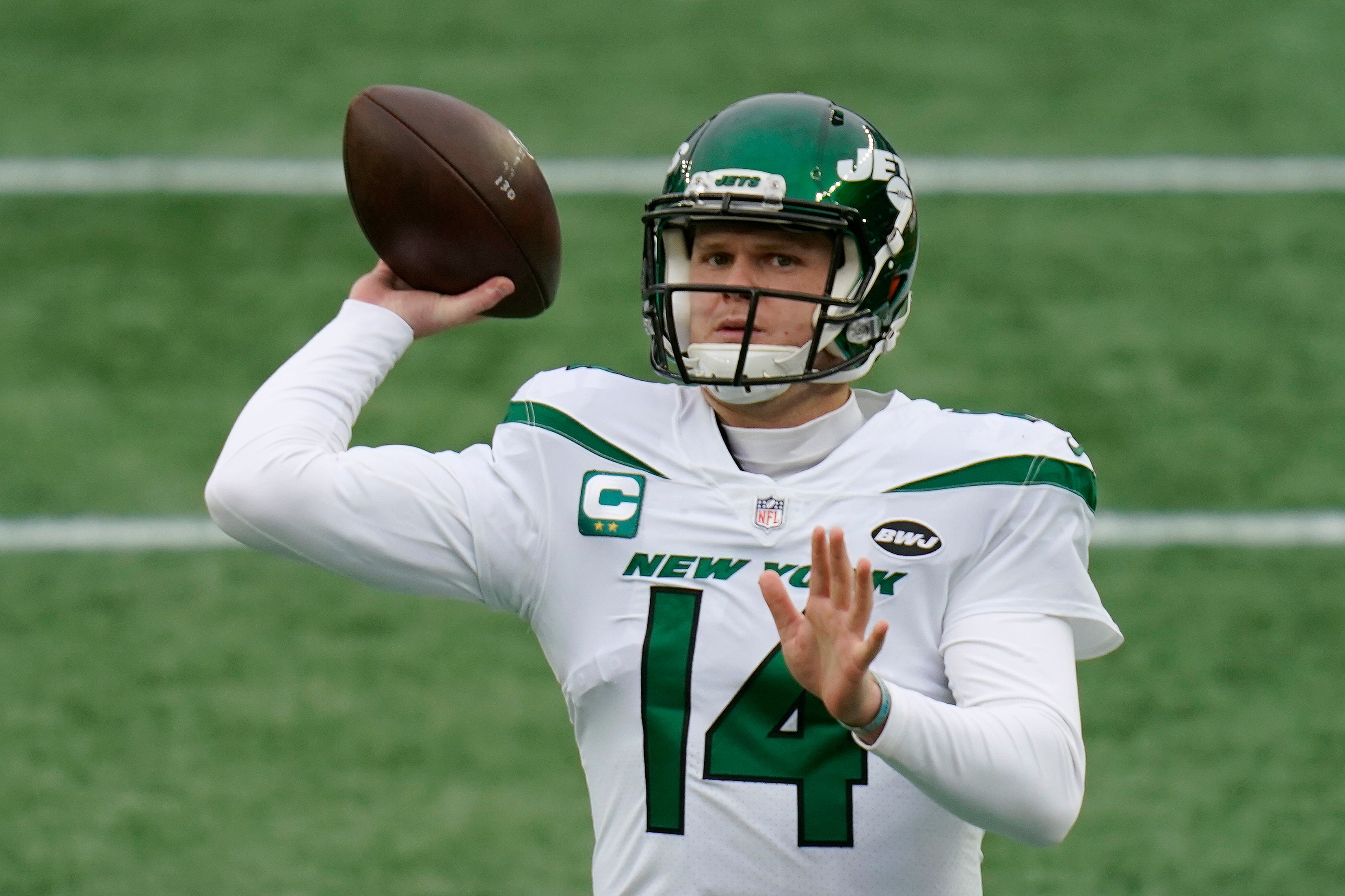New York Jets quarterback Sam Darnold warms up before an NFL football game against the New England Patriots, Sunday, Jan. 3, 2021, in Foxborough, Mass. (AP Photo/Charles Krupa)