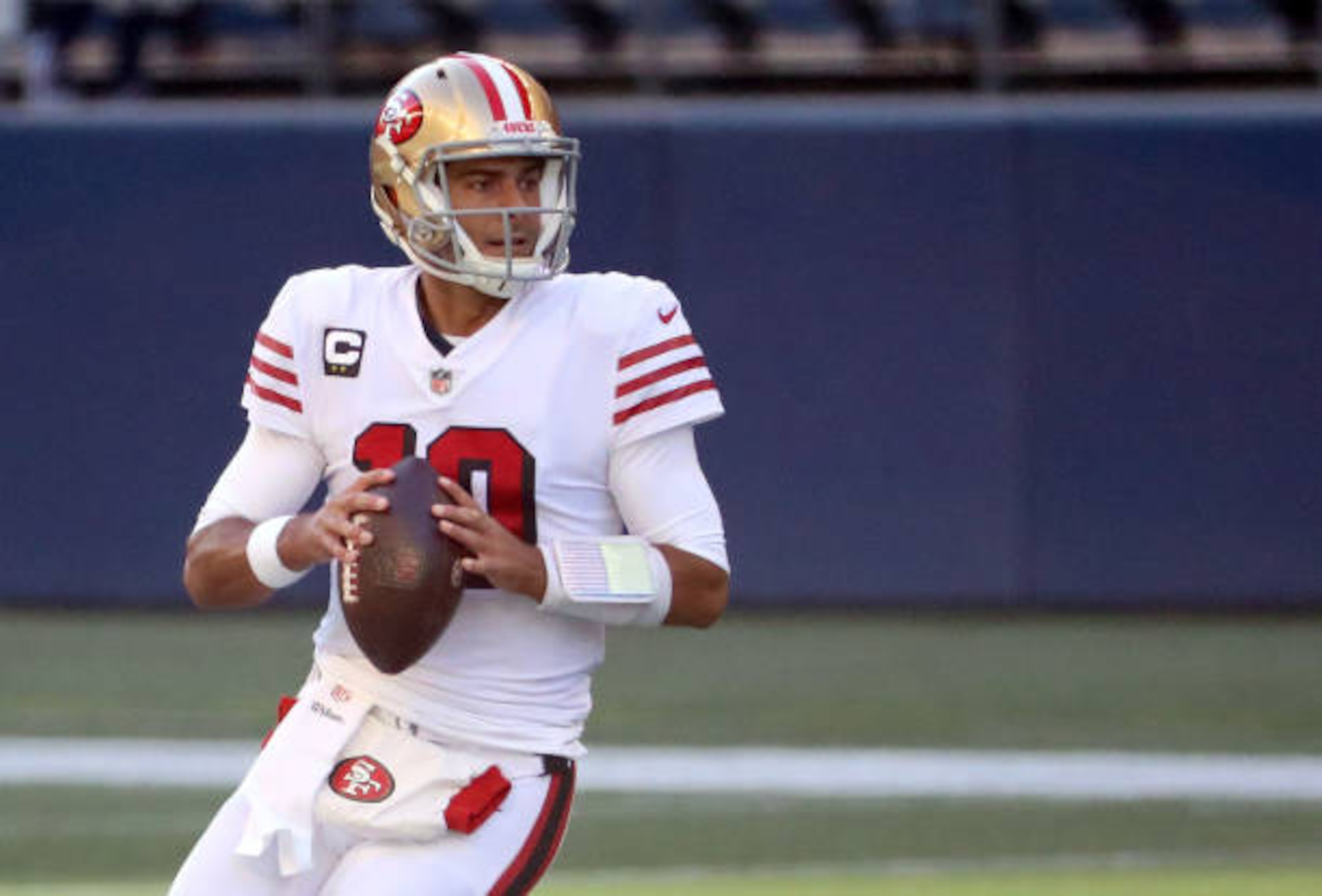 SEATTLE, WASHINGTON - NOVEMBER 01: Quarterback Jimmy Garoppolo #10 of the San Francisco 49ers looks to throw the ball against the Seattle Seahawks in the first quarter of the game at CenturyLink Field on November 01, 2020 in Seattle, Washington. (Photo by Abbie Parr/Getty Images) SEATTLE, WASHINGTON - NOVEMBER 01: Quarterback Jimmy Garoppolo #10 of the San Francisco 49ers looks to throw the ball against the Seattle Seahawks in the first quarter of the game at CenturyLink Field on November 01, 2020 in Seattle, Washington. (Photo by Abbie Parr/Getty Images)