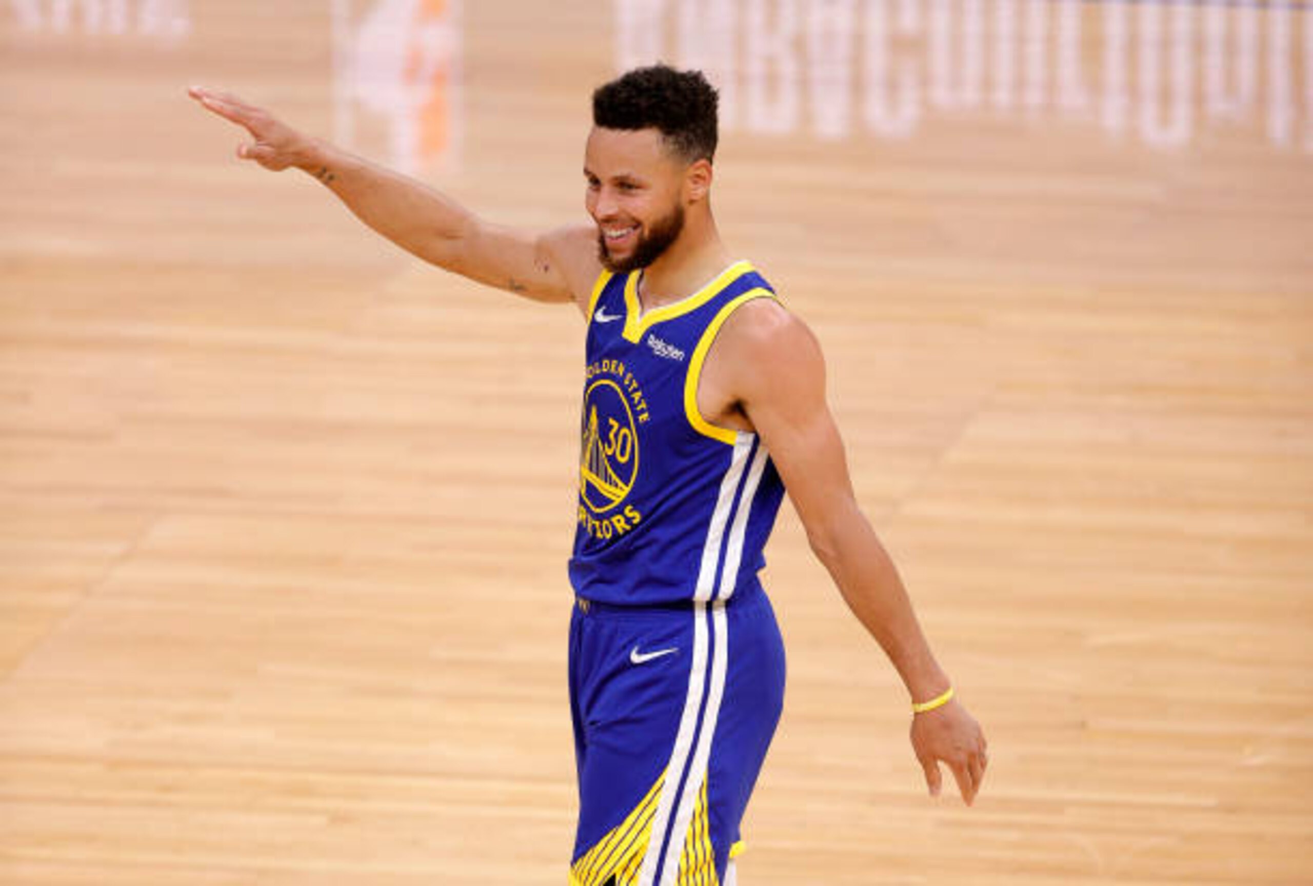 SAN FRANCISCO, CALIFORNIA - APRIL 12:  Stephen Curry #30 of the Golden State Warriors reacts after the Warriors made a basket against the Denver Nuggets at Chase Center on April 12, 2021 in San Francisco, California. NOTE TO USER: User expressly acknowledges and agrees that, by downloading and or using this photograph, User is consenting to the terms and conditions of the Getty Images License Agreement. (Photo by Ezra Shaw/Getty Images)