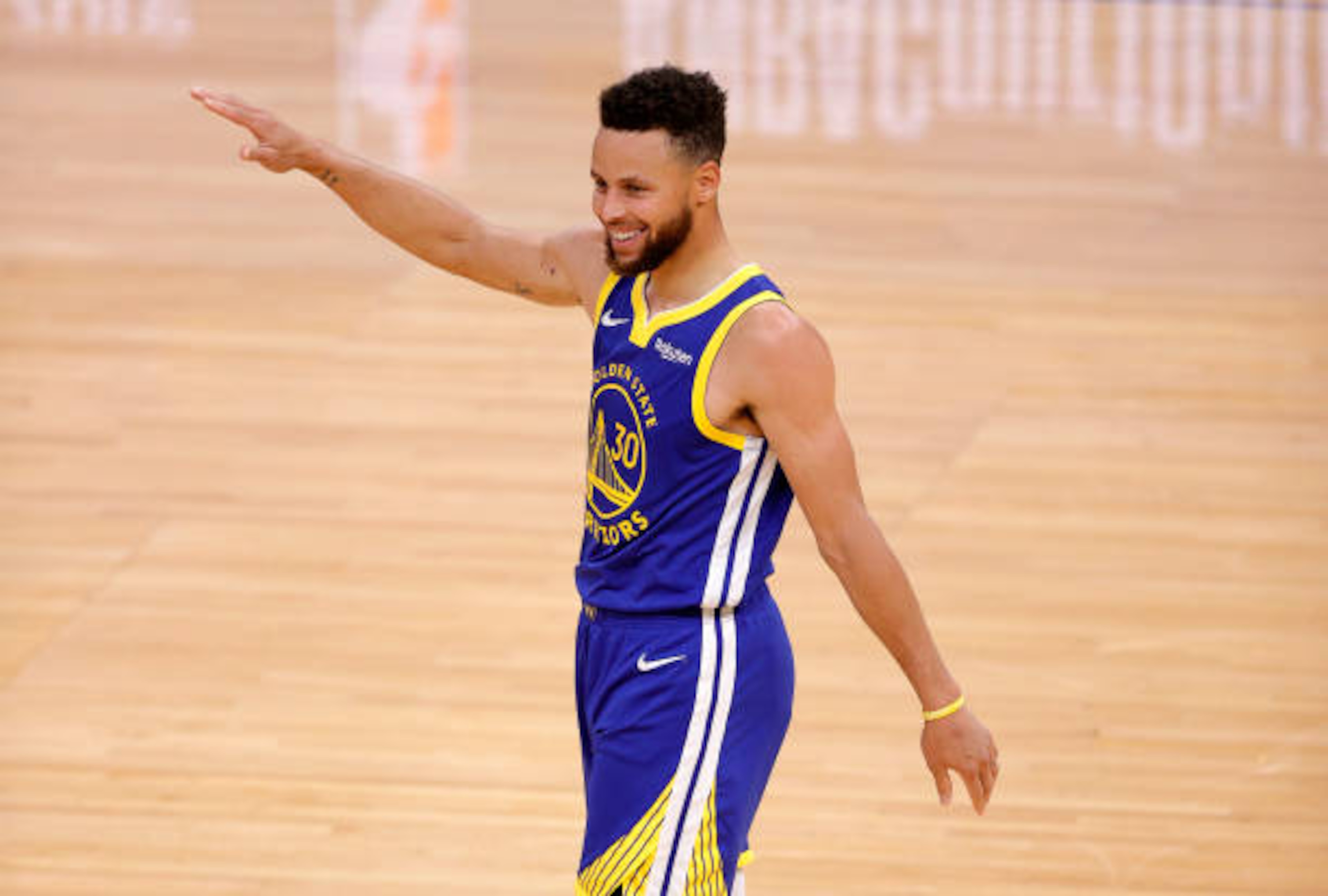SAN FRANCISCO, CALIFORNIA - APRIL 12:  Stephen Curry #30 of the Golden State Warriors reacts after the Warriors made a basket against the Denver Nuggets at Chase Center on April 12, 2021 in San Francisco, California. NOTE TO USER: User expressly acknowledges and agrees that, by downloading and or using this photograph, User is consenting to the terms and conditions of the Getty Images License Agreement. (Photo by Ezra Shaw/Getty Images)
