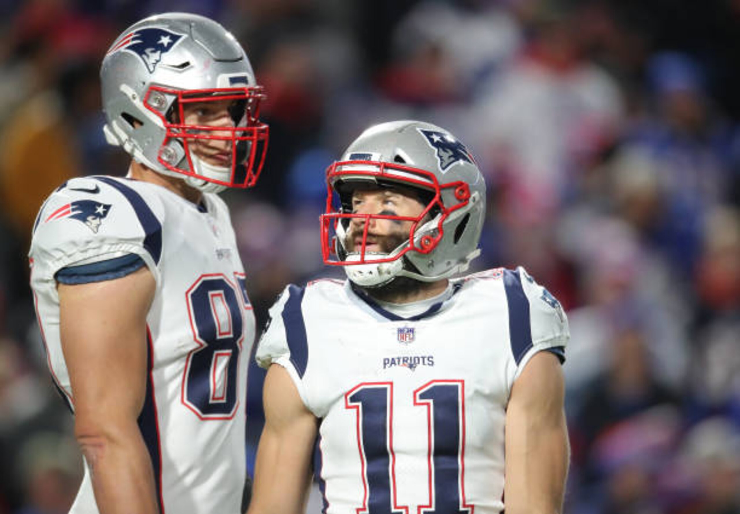 BUFFALO, NY - OCTOBER 29: Julian Edelman #11 of the New England Patriots talks to Rob Gronkowski #87 during NFL game action against the Buffalo Bills at New Era Field on October 29, 2018 in Buffalo, New York. (Photo by Tom Szczerbowski/Getty Images)