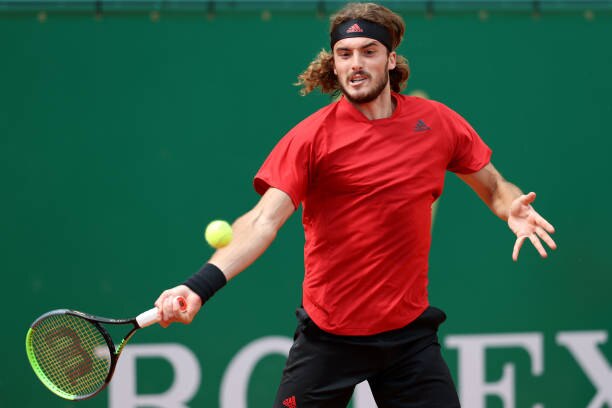 MONTE-CARLO, MONACO - APRIL 13: Stefanos Tsitsipas of Greece in action in his mens singles match against Aslan Karatsev of Russia during the second round on day three of the Rolex Monte-Carlo Masters at Monte-Carlo Country Club on April 13, 2021 in Monte-Carlo, Monaco. (Photo by Alexander Hassenstein/Getty Images)