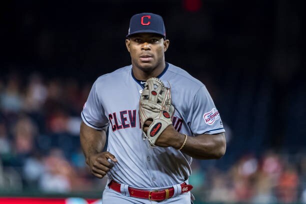 WASHINGTON, DC - SEPTEMBER 27: Yasiel Puig #66 of the Cleveland Indians returns to the dugout after fielding during the eighth inning against the Washington Nationals at Nationals Park on September 27, 2019 in Washington, DC. (Photo by Scott Taetsch/Getty Images)