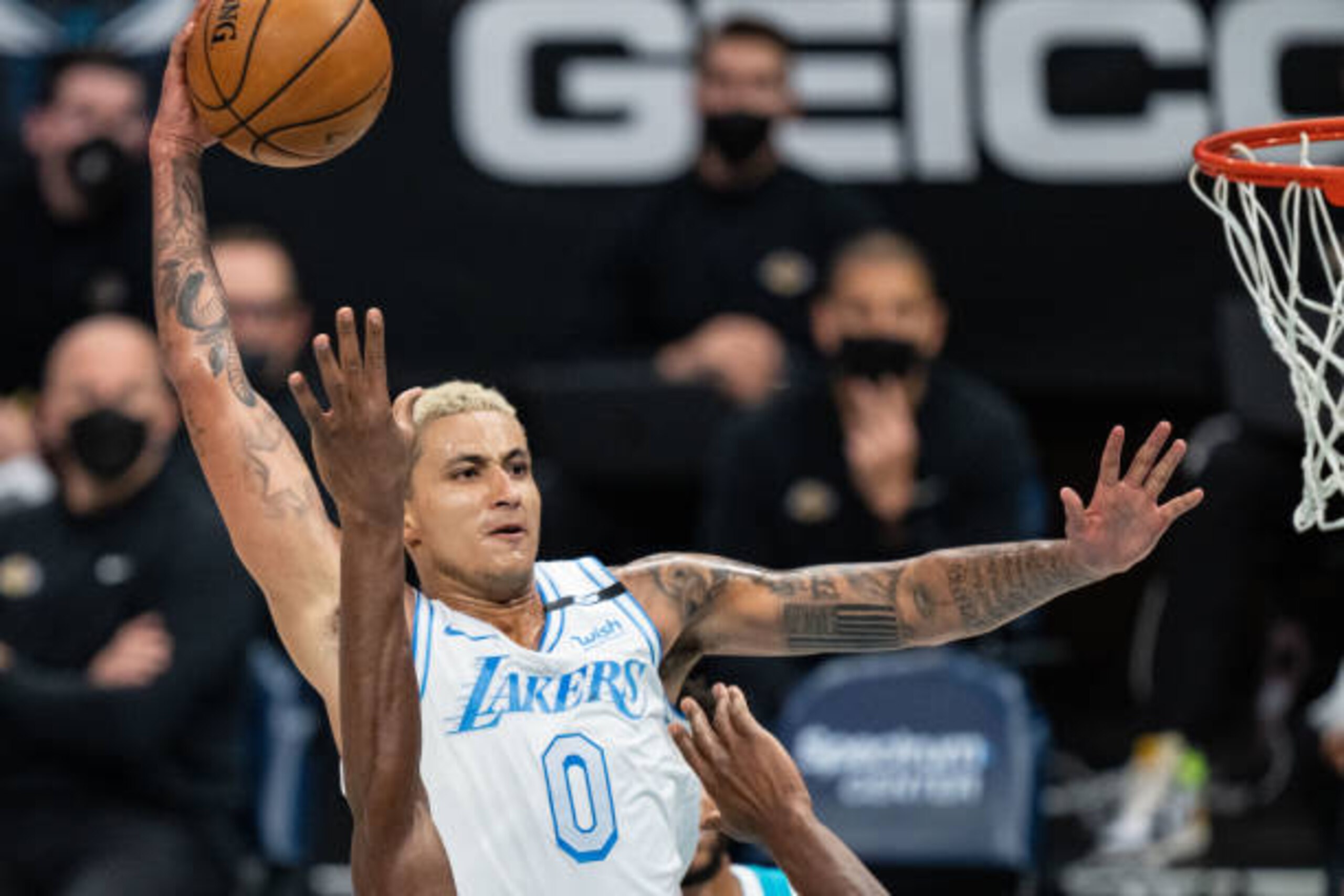 CHARLOTTE, NORTH CAROLINA - APRIL 13: Kyle Kuzma #0 of the Los Angeles Lakers dunks the ball against the Charlotte Hornets in the second quarter during their game at Spectrum Center on April 13, 2021 in Charlotte, North Carolina. NOTE TO USER: User expressly acknowledges and agrees that, by downloading and or using this photograph, User is consenting to the terms and conditions of the Getty Images License Agreement. (Photo by Jacob Kupferman/Getty Images)