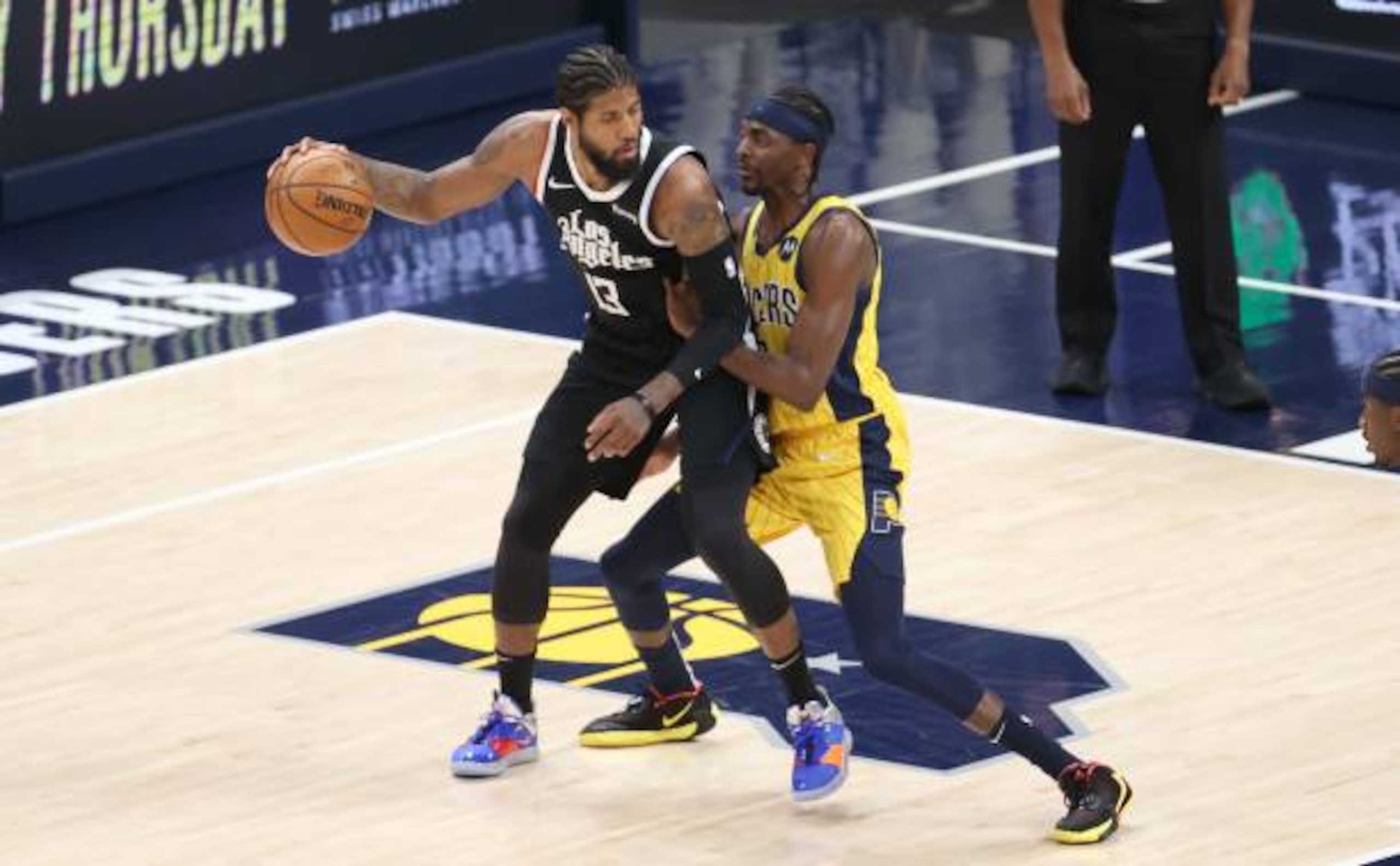 INDIANAPOLIS, INDIANA - APRIL 13:   Paul George #13 of the Los Angeles Clippers dribbles the ball against the  Indiana Pacers at Bankers Life Fieldhouse on April 13, 2021 in Indianapolis, Indiana.    NOTE TO USER: User expressly acknowledges and agrees that, by downloading and or using this Photograph, user is consenting to the terms and conditions of the Getty Images License Agreement.
 (Photo by Andy Lyons/Getty Images)