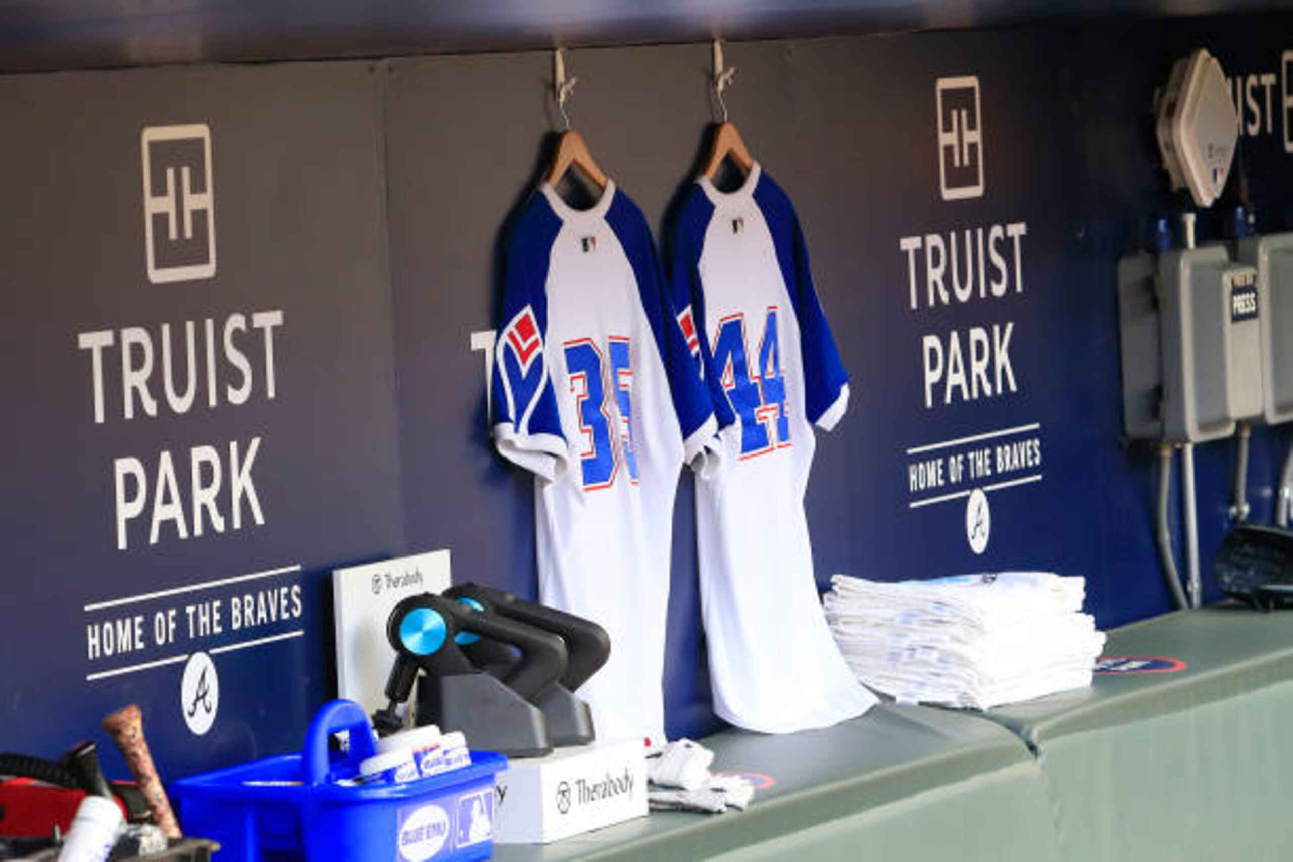 ATLANTA, GA - APRIL 09: The Braves honor Hank Aaron and Phil Niekro by hanging their jerseys in the dugout  during the Atlanta Braves 2021 season home opener against the Philadelphia Phillies on April 09, 2021 at Truist Park in Atlanta, Georgia.  (Photo by David J. Griffin/Icon Sportswire via Getty Images)