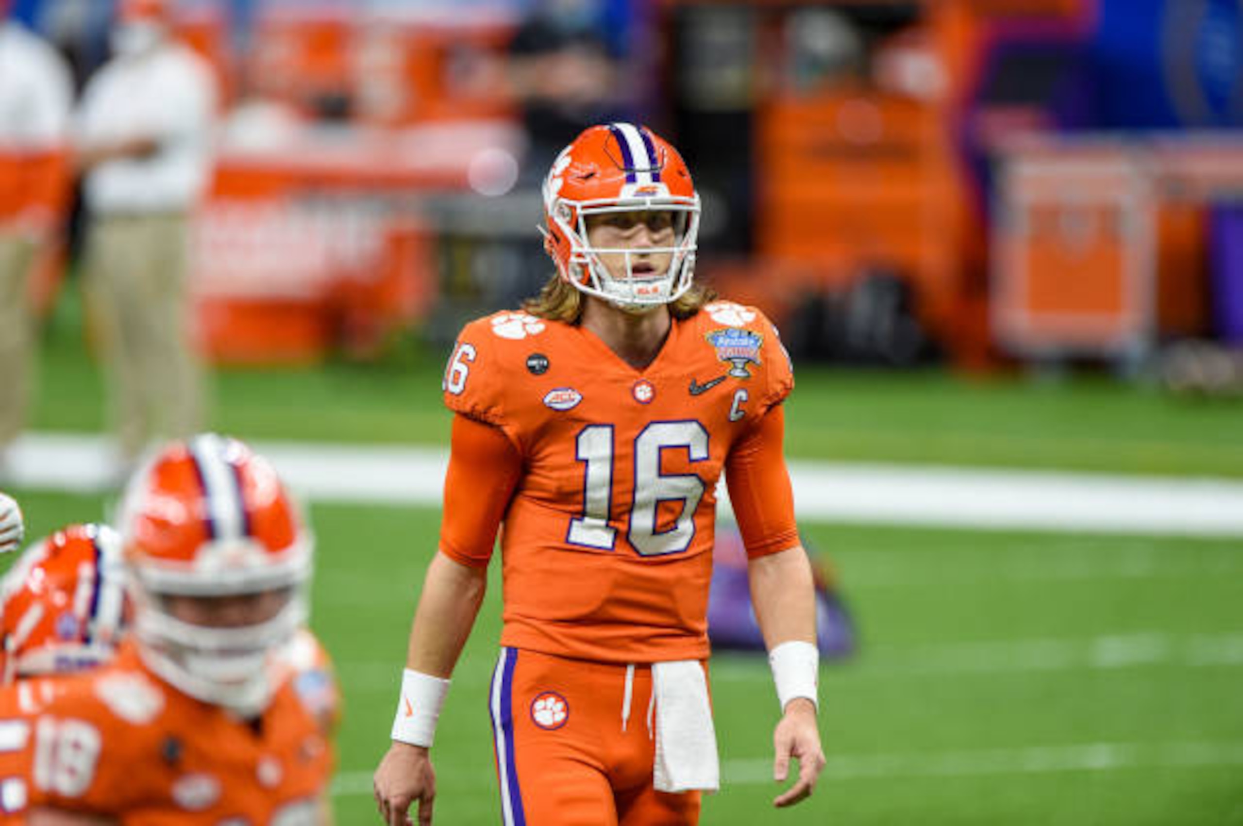 NEW ORLEANS, LA - JANUARY 01: Clemson Tigers quarterback Trevor Lawrence (16) warms up before the Allstate Sugar Bowl College Football Playoff Semifinal between the Ohio State Buckeyes and Clemson Tigers at the Mercedes-Benz Superdome on January 1, 2021 in New Orleans, LA. (Photo by Ken Murray/Icon Sportswire via Getty Images)