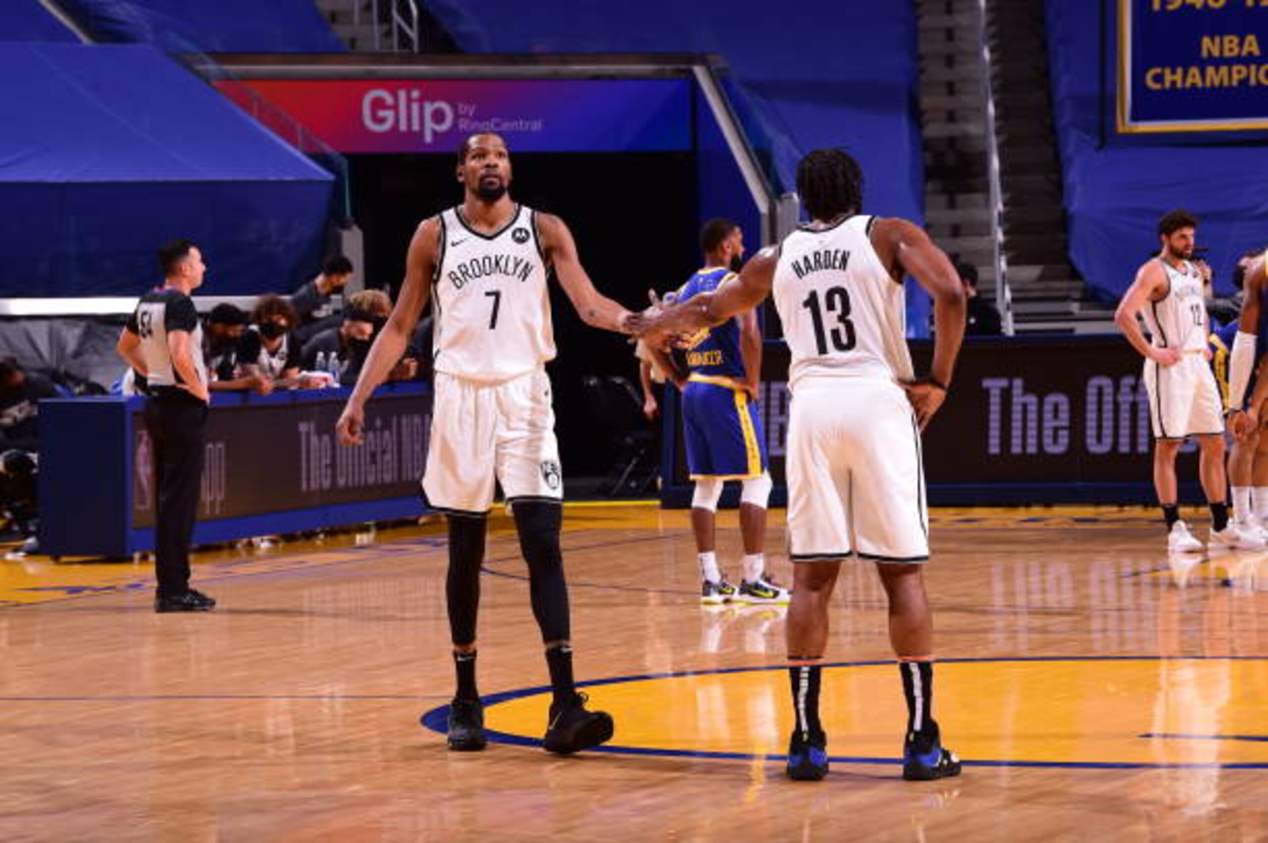 SAN FRANCISCO, CA - FEBRUARY 13: Kevin Durant #7 of the Brooklyn Nets high-fives teammate James Harden #13 during the game against the Golden State Warriors on February 13, 2021 at Chase Center in San Francisco, California. NOTE TO USER: User expressly acknowledges and agrees that, by downloading and or using this photograph, user is consenting to the terms and conditions of Getty Images License Agreement. Mandatory Copyright Notice: Copyright 2021 NBAE (Photo by Noah Graham/NBAE via Getty Images)
