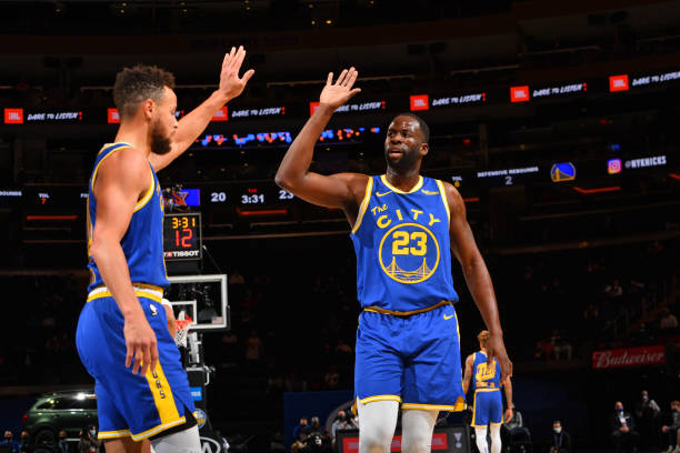 NEW YORK, NY - FEBRUARY 23: Stephen Curry #30 of the Golden State Warriors and Draymond Green #23 of the Golden State Warriors high-five during a game against the New York Knicks on February 23, 2021 at Madison Square Garden in New York City, New York. NOTE TO USER: User expressly acknowledges and agrees that, by downloading and/or using this Photograph, user is consenting to the terms and conditions of the Getty Images License Agreement. Mandatory Copyright Notice: Copyright 2021 NBAE (Photo by Jesse D. Garrabrant/NBAE via Getty Images)