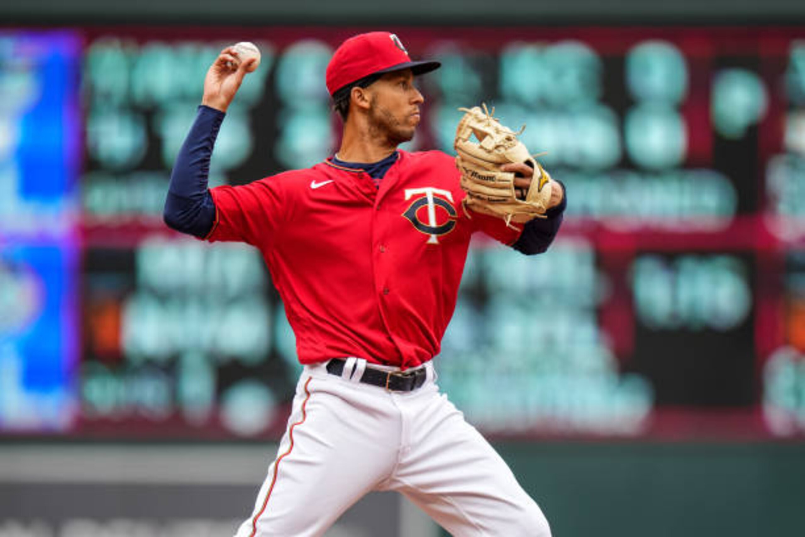 MINNEAPOLIS, MN - APRIL 10: Andrelton Simmons #9 of the Minnesota Twins throws against the Seattle Mariners on April 10, 2021 at Target Field in Minneapolis, Minnesota. (Photo by Brace Hemmelgarn/Minnesota Twins/Getty Images)