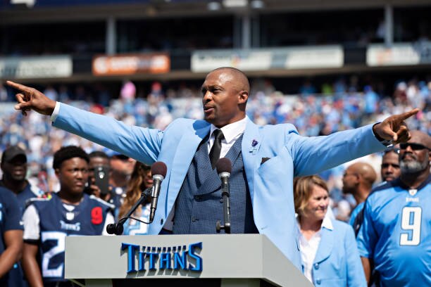 NASHVILLE, TN - SEPTEMBER 15:  Eddie George of the Tennessee Titans points to the fans during the halftime ceremony to have his number retired during a game against the Indianapolis Colts at Nissan Stadium on September 15, 2019 in Nashville,Tennessee.   (Photo by Wesley Hitt/Getty Images)
