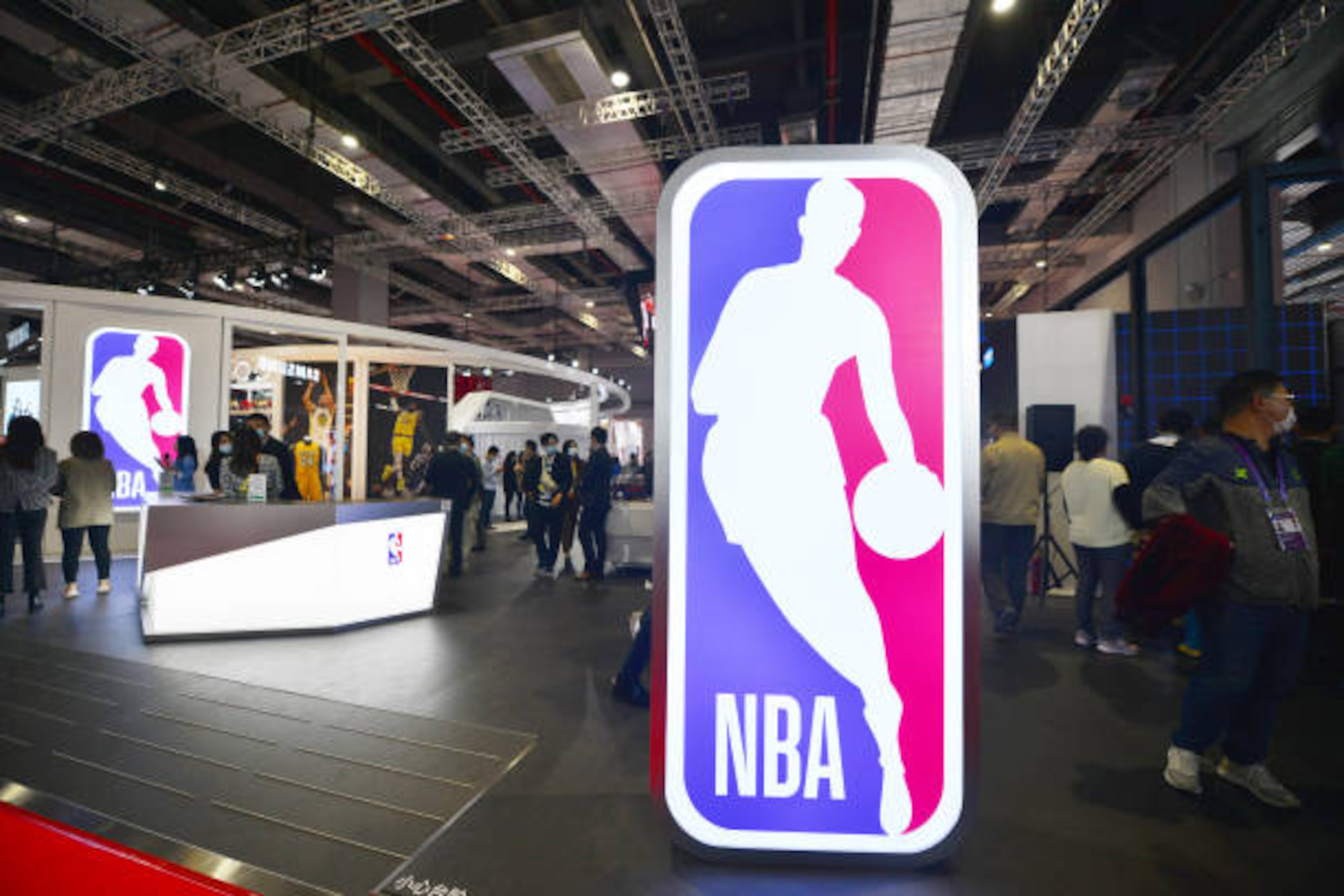 SHANGHAI, CHINA - NOVEMBER 09: People visit the NBA stand during the 3rd China International Import Expo (CIIE) at the National Exhibition and Convention Center on November 9, 2020 in Shanghai, China. (Photo by Shen Chunchen/VCG via Getty Images) SHANGHAI, CHINA - NOVEMBER 09: People visit the NBA stand during the 3rd China International Import Expo (CIIE) at the National Exhibition and Convention Center on November 9, 2020 in Shanghai, China. (Photo by Shen Chunchen/VCG via Getty Images)