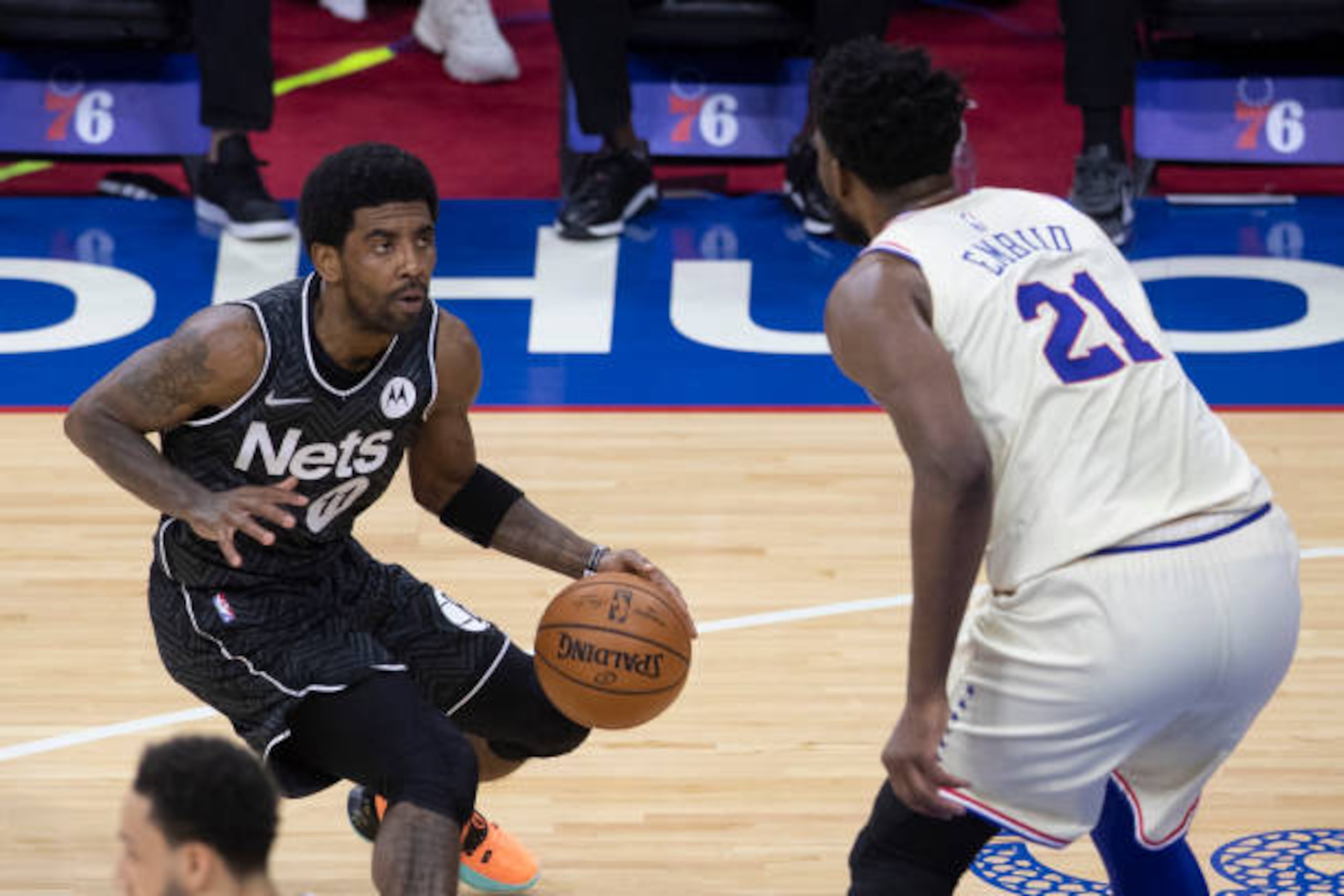 PHILADELPHIA, PA - APRIL 14: Kyrie Irving #11 of the Brooklyn Nets controls the ball against Joel Embiid #21 of the Philadelphia 76ers in the first quarter at the Wells Fargo Center on April 14, 2021 in Philadelphia, Pennsylvania. NOTE TO USER: User expressly acknowledges and agrees that, by downloading and or using this photograph, User is consenting to the terms and conditions of the Getty Images License Agreement. (Photo by Mitchell Leff/Getty Images) PHILADELPHIA, PA - APRIL 14: Kyrie Irving #11 of the Brooklyn Nets controls the ball against Joel Embiid #21 of the Philadelphia 76ers in the first quarter at the Wells Fargo Center on April 14, 2021 in Philadelphia, Pennsylvania. NOTE TO USER: User expressly acknowledges and agrees that, by downloading and or using this photograph, User is consenting to the terms and conditions of the Getty Images License Agreement. (Photo by Mitchell Leff/Getty Images)