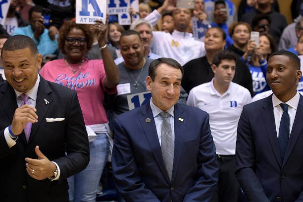 DURHAM, NC - NOVEMBER 11: (L-R) Associate head coach Jeff Capel, head coach Mike Krzyzewski and special assistant Nolan Smith of the Duke Blue Devils smile following their 99-69 win against the Utah Valley Wolverines at Cameron Indoor Stadium on November 11, 2017 in Durham, North Carolina. The win gives Mike Krzyzewski his 1,000th victory as Duke's head coach and his 1,073rd overall (73 at Army). (Photo by Lance King/Getty Images)