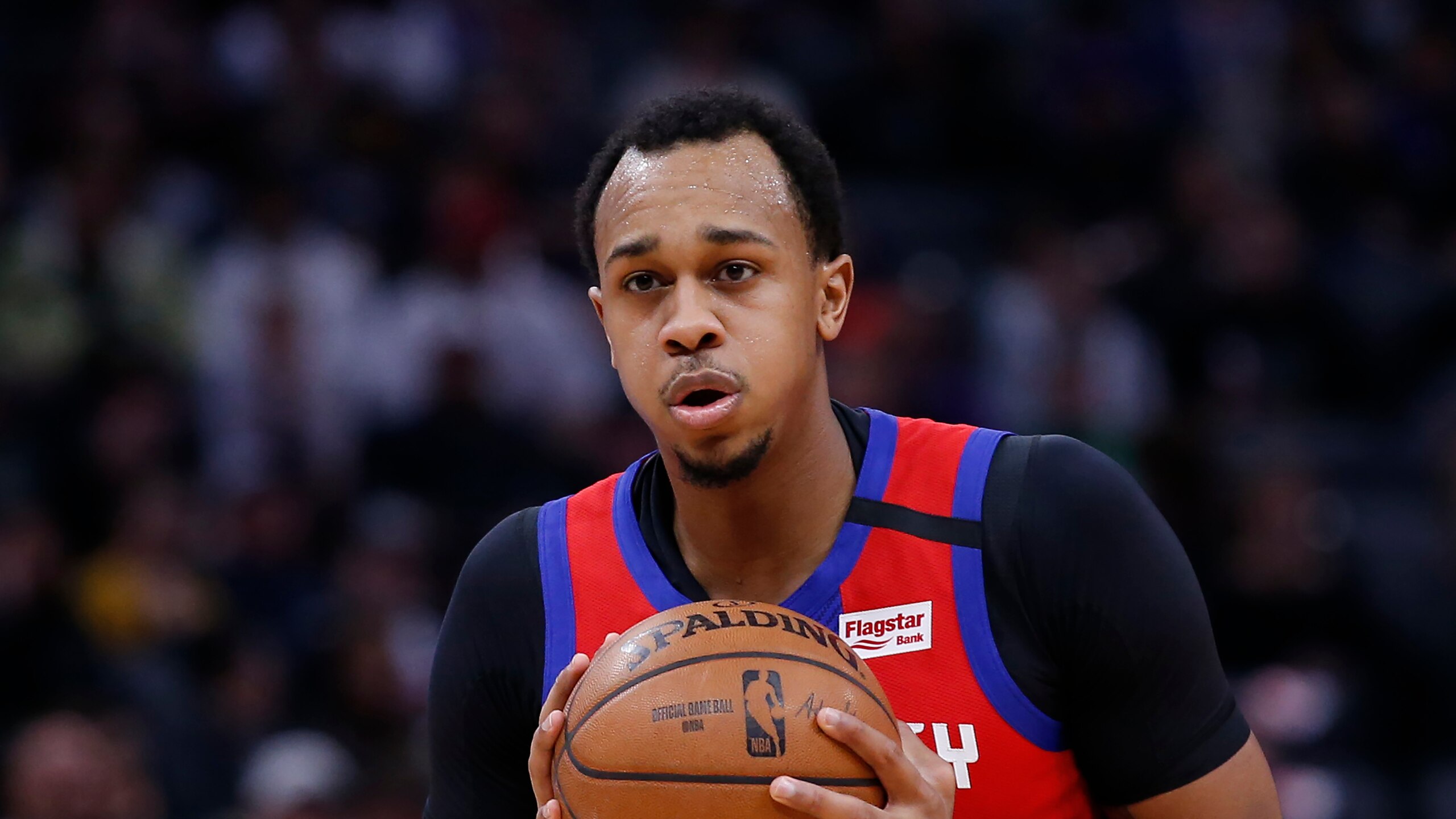 Detroit Pistons forward John Henson looks to pass during the first half of an NBA basketball game against the Sacramento Kings in Sacramento, Calif., Sunday, March 1, 2020.The Kings won 106-100. (AP Photo/Rich Pedroncelli)