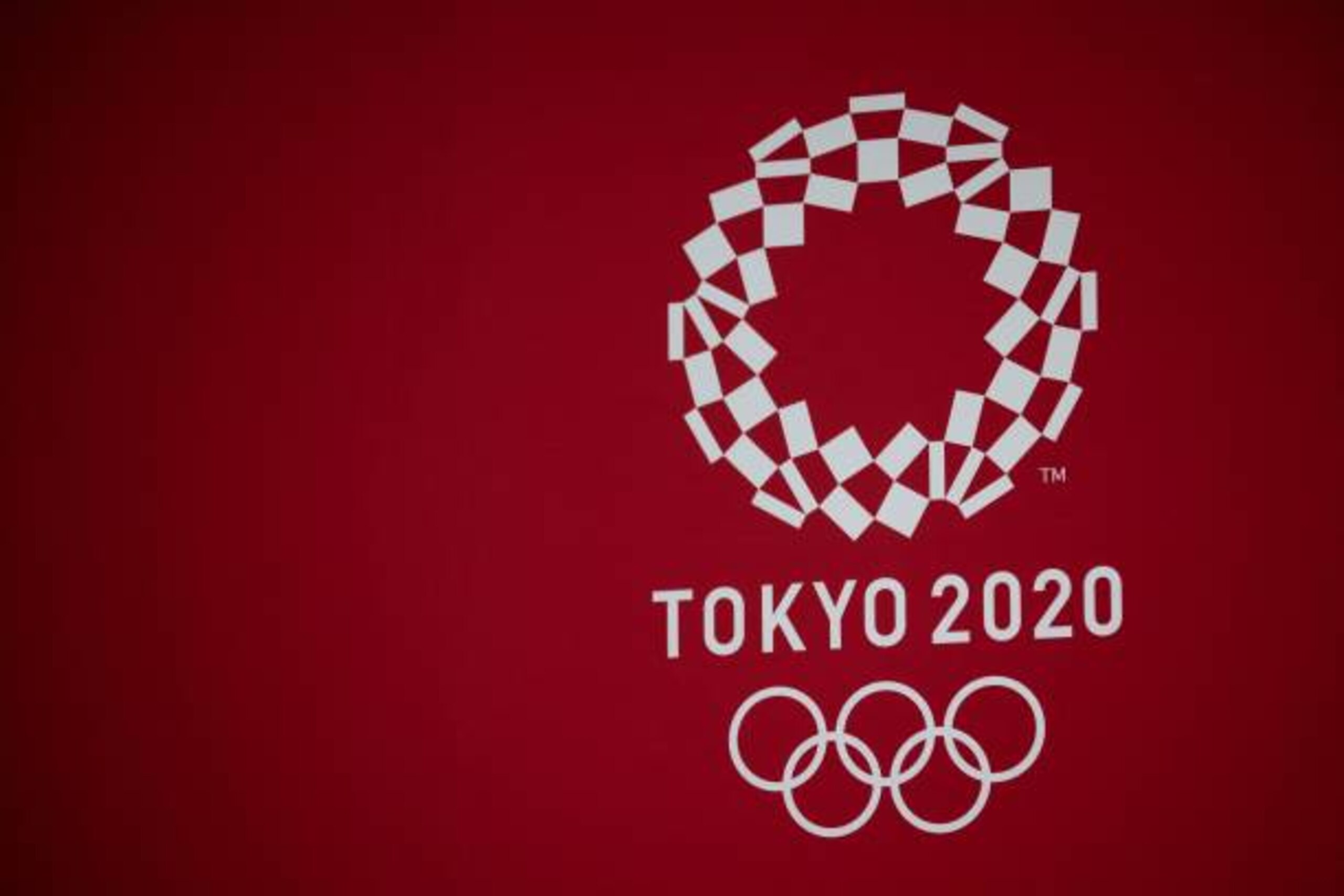 A logo of the Tokyo 2020 Olympic Games is seen during a press event of a traditional crafts collection in Tokyo on April 15, 2021. (Photo by Yuki IWAMURA / AFP) (Photo by YUKI IWAMURA/AFP via Getty Images)