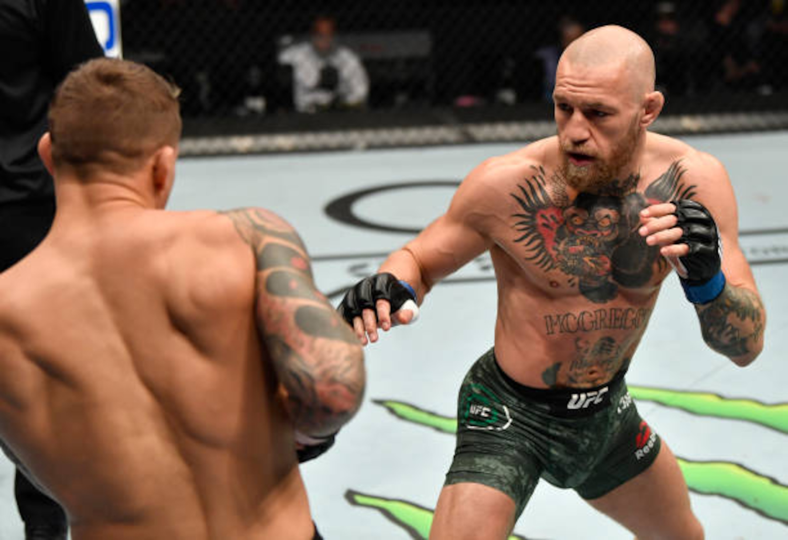 ABU DHABI, UNITED ARAB EMIRATES - JANUARY 23: (R-L) Conor McGregor of Ireland battles Dustin Poirier in a lightweight fight during the UFC 257 event inside Etihad Arena on UFC Fight Island on January 23, 2021 in Abu Dhabi, United Arab Emirates. (Photo by Jeff Bottari/Zuffa LLC)