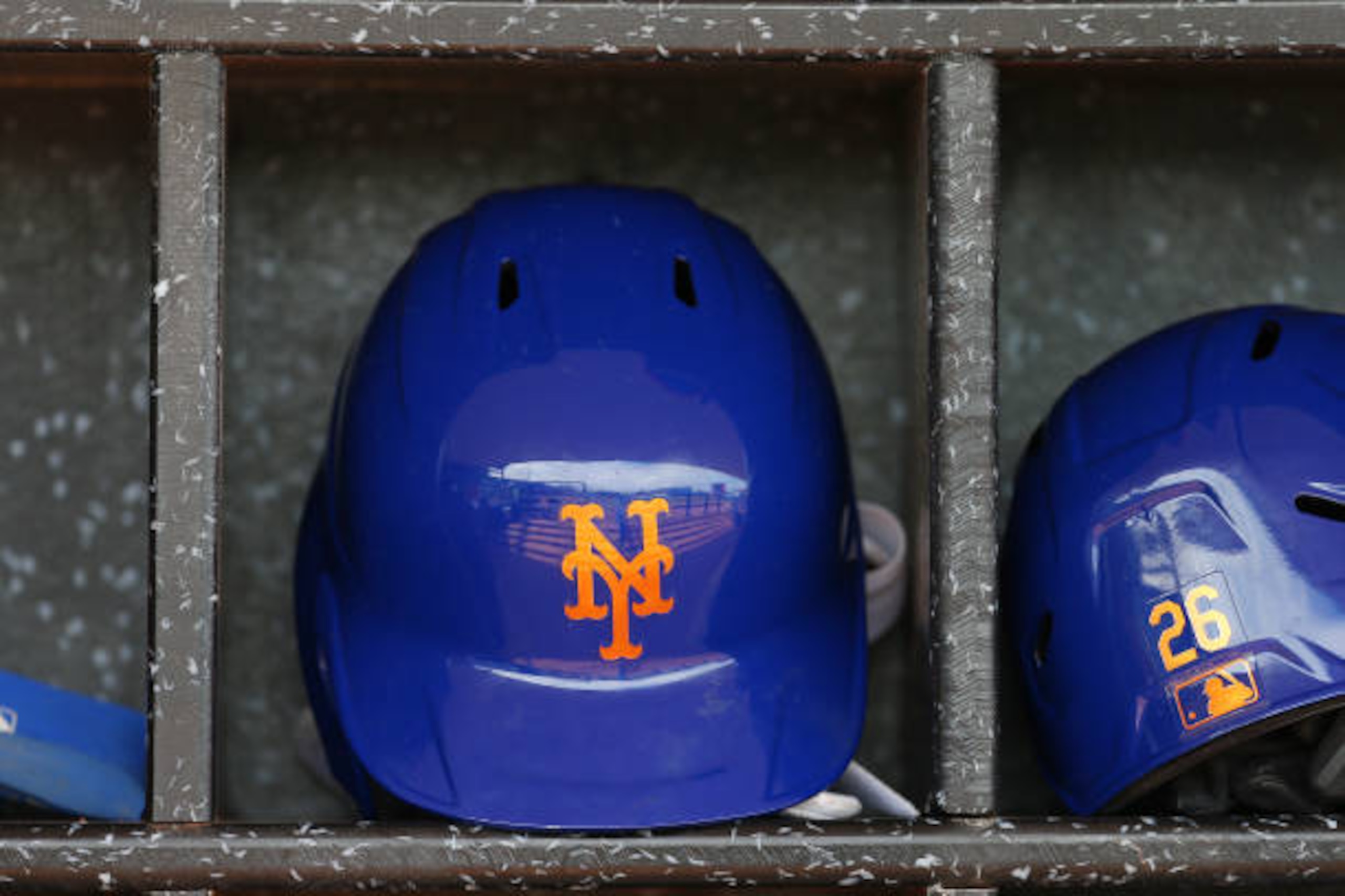 PORT ST. LUCIE, FL - MARCH 08: A New York Mets batting helmet in the dugout before a spring training baseball game against the Houston Astros at Clover Park on March 8, 2020 in Port St. Lucie, Florida. The Mets defeated the Astros 3-1. (Photo by Rich Schultz/Getty Images)