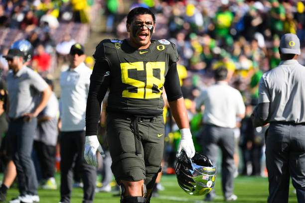 PASADENA, CA - JANUARY 01: Oregon Ducks (58) Penei Sewell (OL) looks on before the Rose Bowl game between the Wisconsin Badgers and the Oregon Ducks on January 1, 2020 at the Rose Bowl in Pasadena, CA. (Photo by Brian Rothmuller/Icon Sportswire via Getty Images)