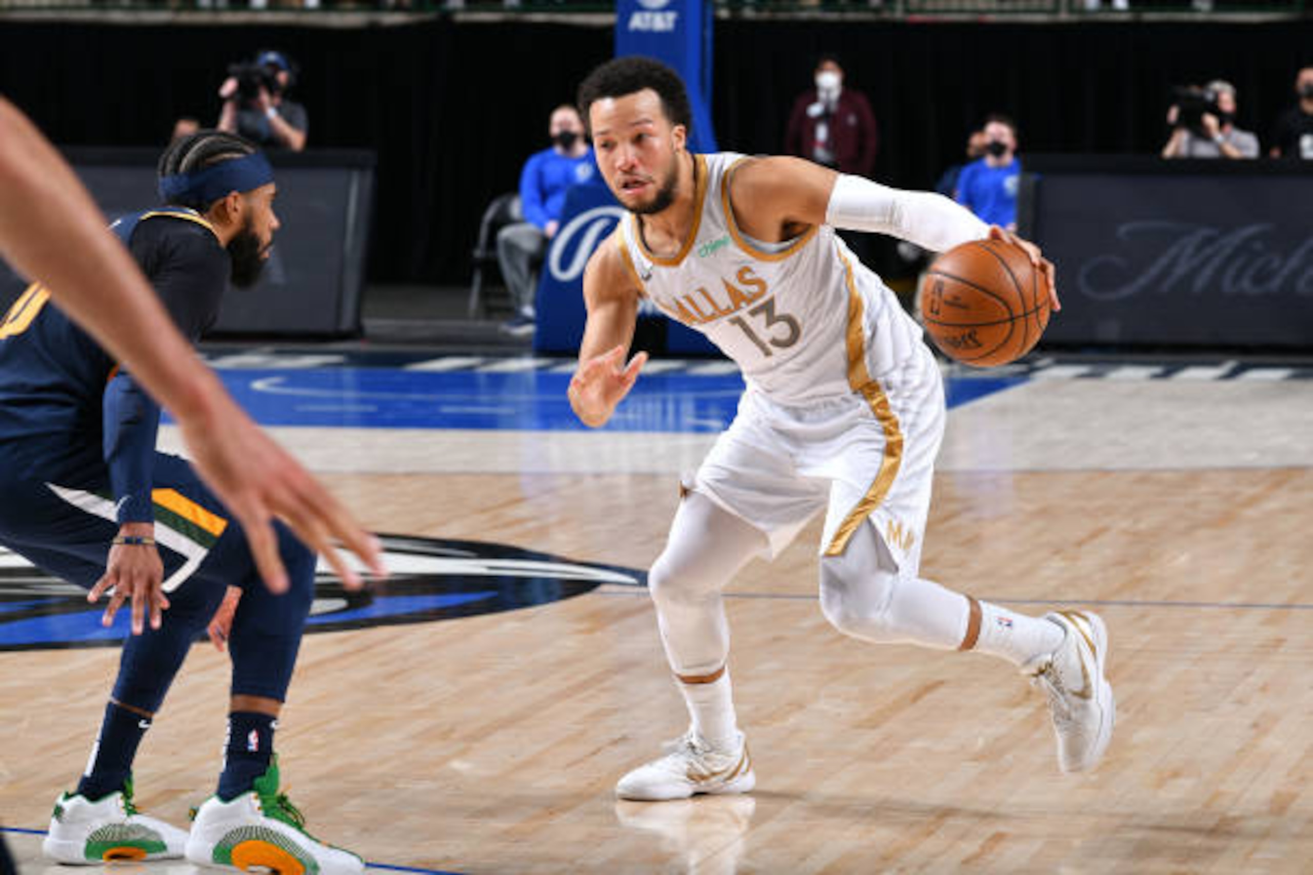 DALLAS, TX - APRIL 5: Jalen Brunson #13 of the Dallas Mavericks dribbles the ball against the Utah Jazz on April 5, 2021 at the American Airlines Center in Dallas, Texas. NOTE TO USER: User expressly acknowledges and agrees that, by downloading and or using this photograph, User is consenting to the terms and conditions of the Getty Images License Agreement. Mandatory Copyright Notice: Copyright 2021 NBAE (Photo by Glenn James/NBAE via Getty Images)