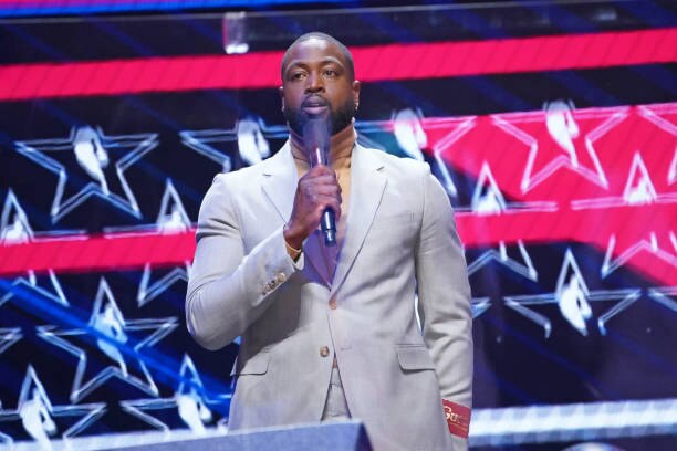 ATLANTA, GA - MARCH 7: Dwyane Wade speaks to the crowd during the 70th NBA All Star Game as part of 2021 NBA All Star Weekend on March 7, 2021 at State Farm Arena in Atlanta, Georgia. NOTE TO USER: User expressly acknowledges and agrees that, by downloading and or using this photograph, User is consenting to the terms and conditions of the Getty Images License Agreement. Mandatory Copyright Notice: Copyright 2021 NBAE (Photo by Jesse D. Garrabrant/NBAE via Getty Images)