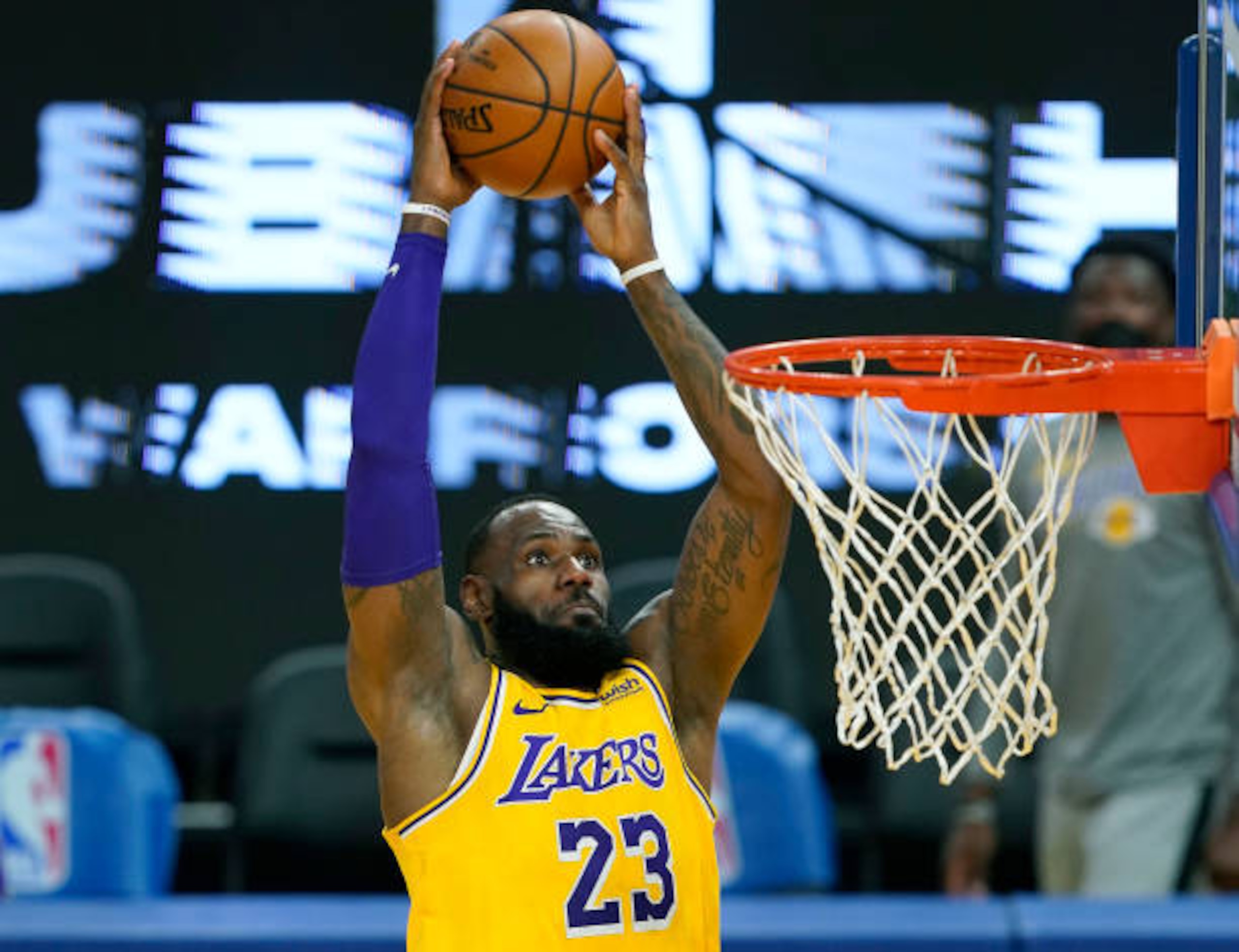 SAN FRANCISCO, CALIFORNIA - MARCH 15: LeBron James #23 of the Los Angeles Lakers goes up for a slam dunk against the Golden State Warriors during the first half of an NBA basketball game at Chase Center on March 15, 2021 in San Francisco, California. NOTE TO USER: User expressly acknowledges and agrees that, by downloading and or using this photograph, User is consenting to the terms and conditions of the Getty Images License Agreement. (Photo by Thearon W. Henderson/Getty Images)
