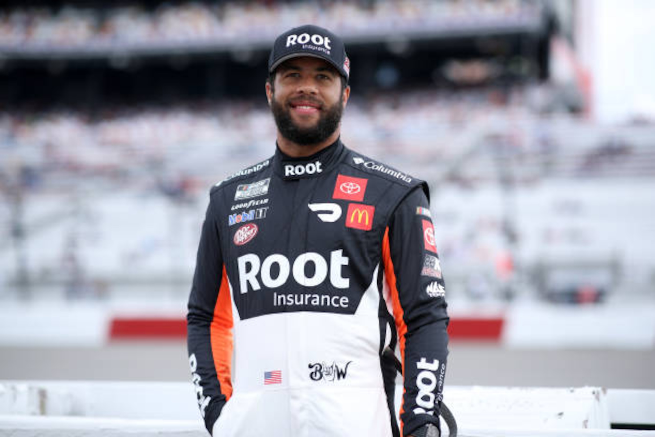 RICHMOND, VIRGINIA - APRIL 18: Bubba Wallace, driver of the #23 Root Insurance Toyota, poses on the grid prior to the NASCAR Cup Series Toyota Owners 400 at Richmond Raceway on April 18, 2021 in Richmond, Virginia. (Photo by Sean Gardner/23XI Racing via Getty Images ) RICHMOND, VIRGINIA - APRIL 18: Bubba Wallace, driver of the #23 Root Insurance Toyota, poses on the grid prior to the NASCAR Cup Series Toyota Owners 400 at Richmond Raceway on April 18, 2021 in Richmond, Virginia. (Photo by Sean Gardner/23XI Racing via Getty Images )