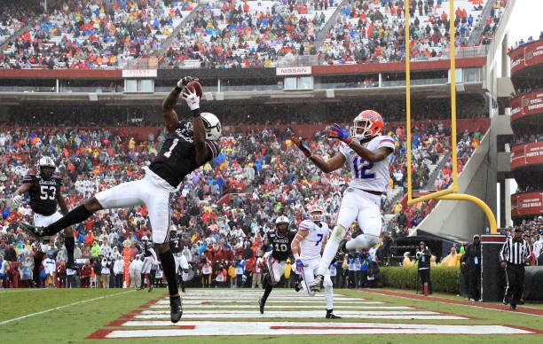 COLUMBIA, SOUTH CAROLINA - OCTOBER 19: Jaycee Horn #1 of the South Carolina Gamecocks goes after a pass against C.J. McWilliams #12 of the Florida Gators during their game at Williams-Brice Stadium on October 19, 2019 in Columbia, South Carolina. (Photo by Streeter Lecka/Getty Images)