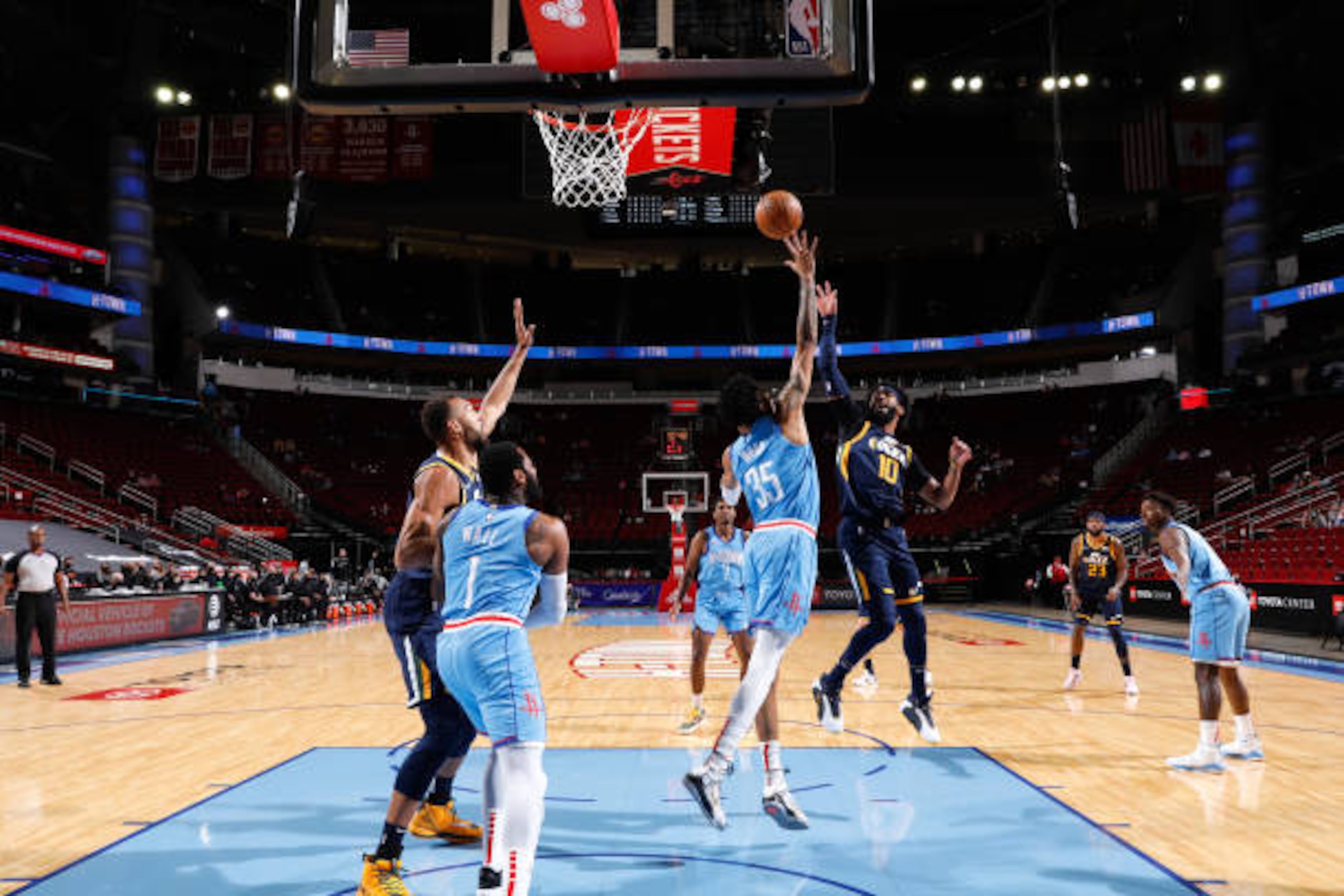 HOUSTON, TX - APRIL 21: Mike Conley #10 of the Utah Jazz shoots the ball during the game against the Houston Rockets on April 21, 2021 at the Toyota Center in Houston, Texas. NOTE TO USER: User expressly acknowledges and agrees that, by downloading and or using this photograph, User is consenting to the terms and conditions of the Getty Images License Agreement. Mandatory Copyright Notice: Copyright 2021 NBAE (Photo by Troy Fields/NBAE via Getty Images)