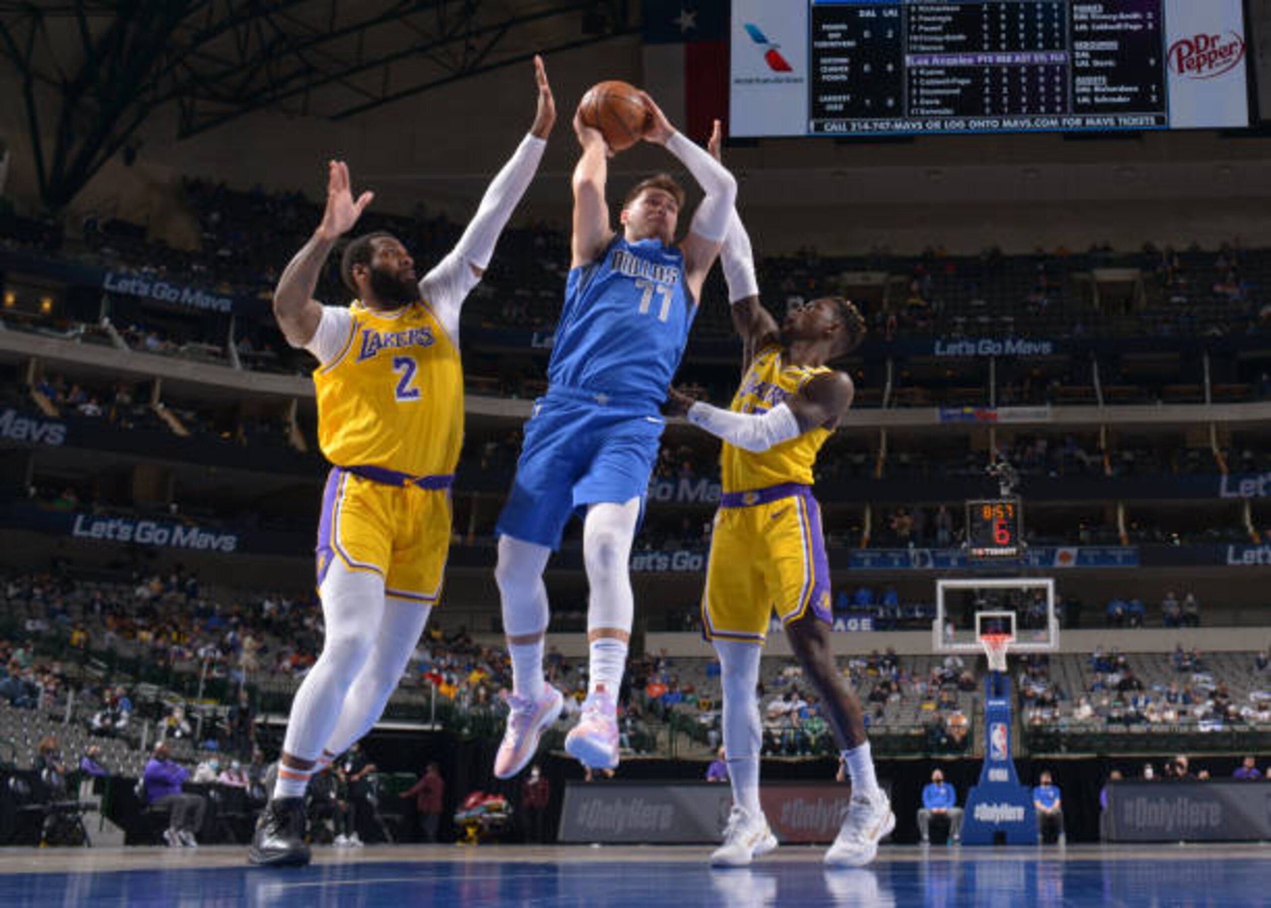 DALLAS, TX - APRIL 22: Luka Doncic #77 of the Dallas Mavericks shoots the ball against the Los Angeles Lakers on April 22, 2021 at the American Airlines Center in Dallas, Texas. NOTE TO USER: User expressly acknowledges and agrees that, by downloading and or using this photograph, User is consenting to the terms and conditions of the Getty Images License Agreement. Mandatory Copyright Notice: Copyright 2021 NBAE (Photo by Glenn James/NBAE via Getty Images)
