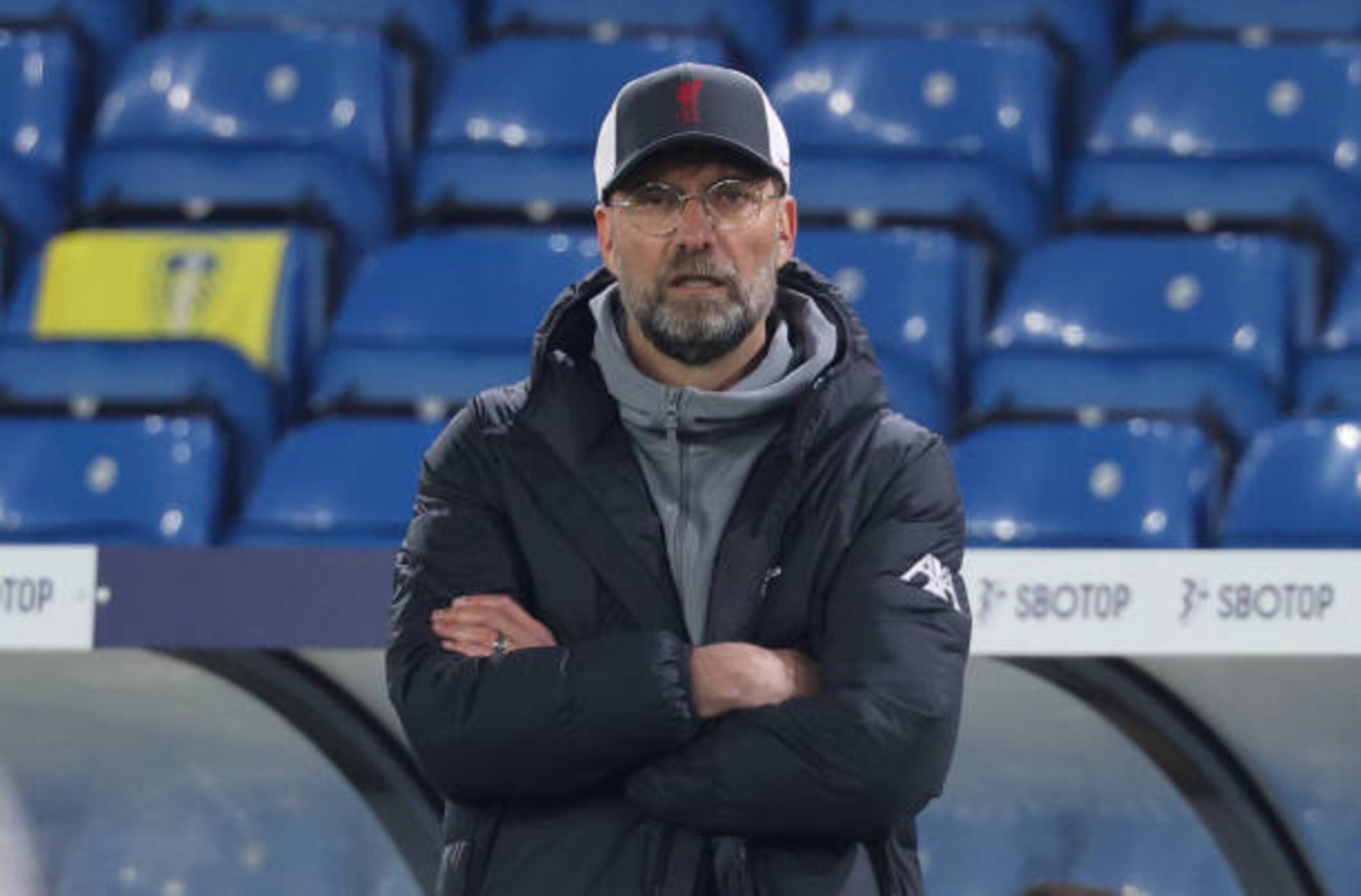 LEEDS, ENGLAND - APRIL 19: Juergen Klopp, Manager of Liverpool looks on during the Premier League match between Leeds United and Liverpool at Elland Road on April 19, 2021 in Leeds, England. Sporting stadiums around the UK remain under strict restrictions due to the Coronavirus Pandemic as Government social distancing laws prohibit fans inside venues resulting in games being played behind closed doors.  (Photo by Clive Brunskill/Getty Images)