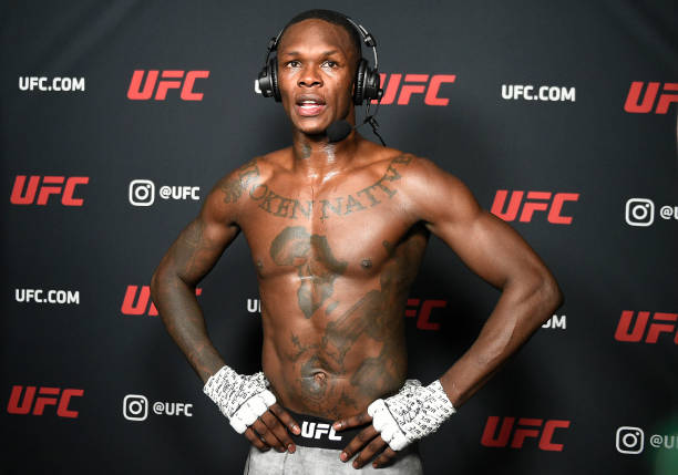 LAS VEGAS, NEVADA - MARCH 06: Israel Adesanya of Nigeria is interviewed after his UFC light heavyweight championship fight against Jan Blachowicz of Poland during the UFC 259 event at UFC APEX on March 06, 2021 in Las Vegas, Nevada. (Photo by Chris Unger/Zuffa LLC)