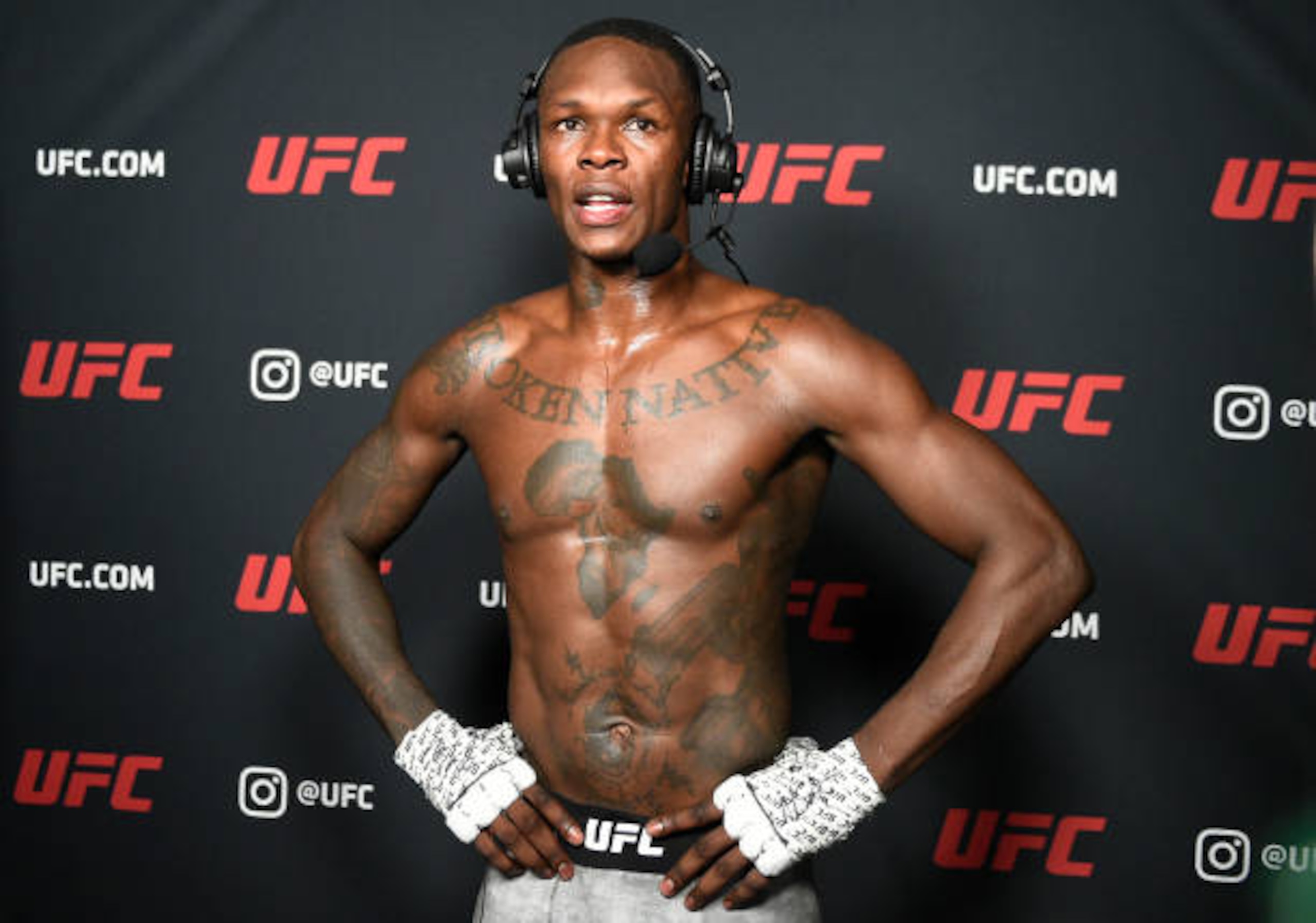 LAS VEGAS, NEVADA - MARCH 06: Israel Adesanya of Nigeria is interviewed after his UFC light heavyweight championship fight against Jan Blachowicz of Poland during the UFC 259 event at UFC APEX on March 06, 2021 in Las Vegas, Nevada. (Photo by Chris Unger/Zuffa LLC)