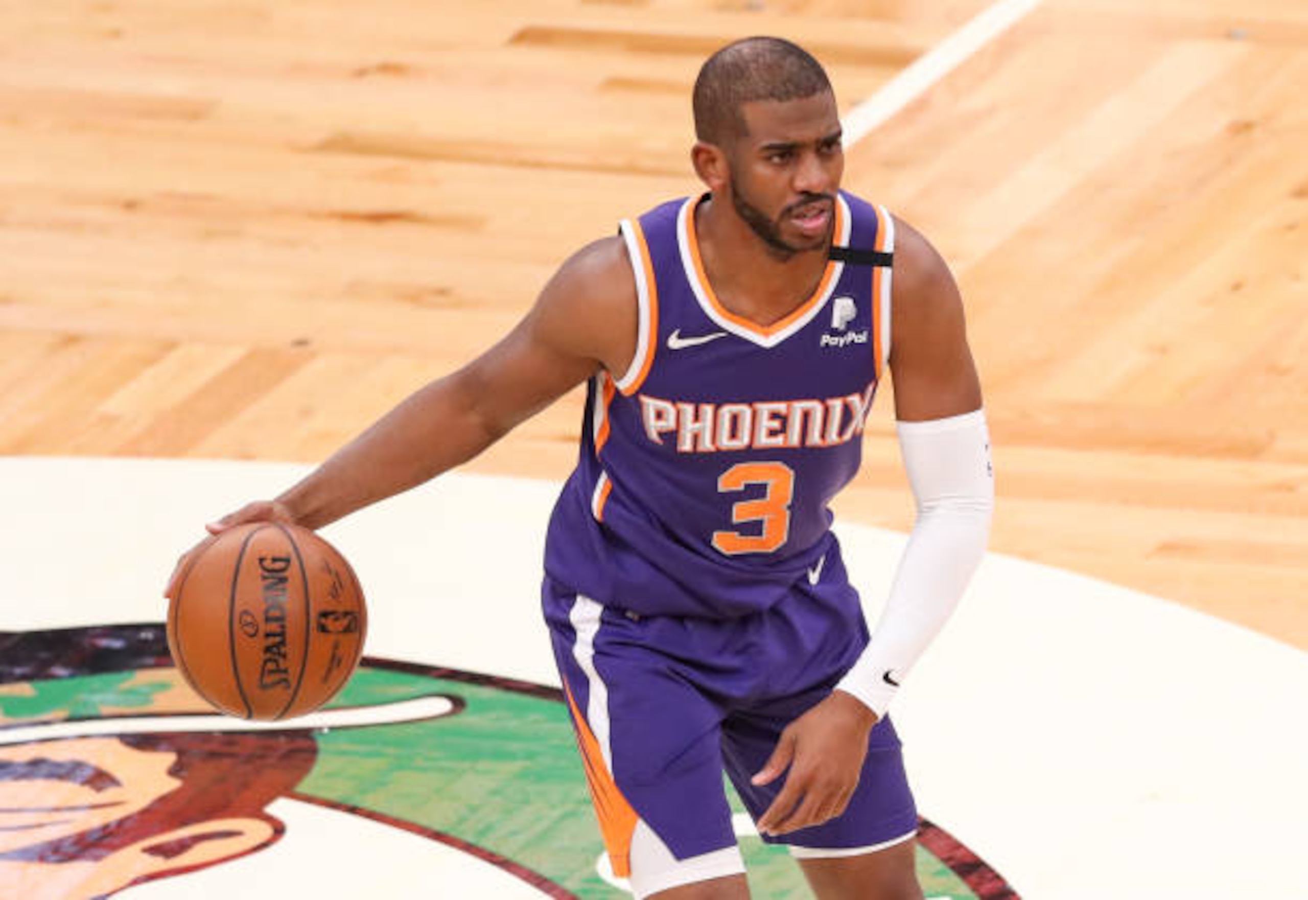 BOSTON, MA - APRIL 22: Chris Paul #3 of the Phoenix Suns dribbles during the game against the Boston Celtics at TD Garden on April 22, 2021 in Boston, Massachusetts. NOTE TO USER: User expressly acknowledges and agrees that, by downloading and or using this photograph, User is consenting to the terms and conditions of the Getty Images License Agreement. (Photo by Adam Glanzman/Getty Images) BOSTON, MA - APRIL 22: Chris Paul #3 of the Phoenix Suns dribbles during the game against the Boston Celtics at TD Garden on April 22, 2021 in Boston, Massachusetts. NOTE TO USER: User expressly acknowledges and agrees that, by downloading and or using this photograph, User is consenting to the terms and conditions of the Getty Images License Agreement. (Photo by Adam Glanzman/Getty Images)