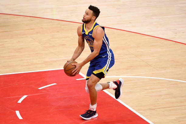 WASHINGTON, DC - APRIL 21: Stephen Curry #30 of the Golden State Warriors dribbles against the Washington Wizards during the second half at Capital One Arena on April 21, 2021 in Washington, DC. NOTE TO USER: User expressly acknowledges and agrees that, by downloading and or using this photograph, User is consenting to the terms and conditions of the Getty Images License Agreement. (Photo by Will Newton/Getty Images)