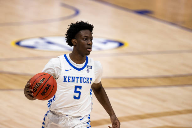 NASHVILLE, TN - MARCH 11:  Terrence Clarke #5 of the Kentucky Wildcats dribbles the ball at half court against the Mississippi State Bulldogs during the first half of their second round game in the SEC Men's Basketball Tournament at Bridgestone Arena on March 11, 2021 in Nashville, Tennessee. (Photo by Brett Carlsen/Getty Images)