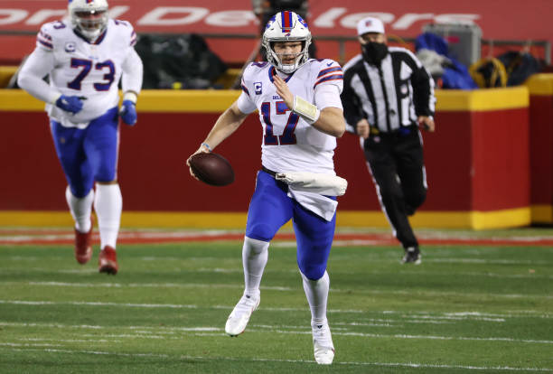 KANSAS CITY, MISSOURI - JANUARY 24: Josh Allen #17 of the Buffalo Bills runs with the ball in the first quarter against the Kansas City Chiefs during the AFC Championship game at Arrowhead Stadium on January 24, 2021 in Kansas City, Missouri. (Photo by Jamie Squire/Getty Images)