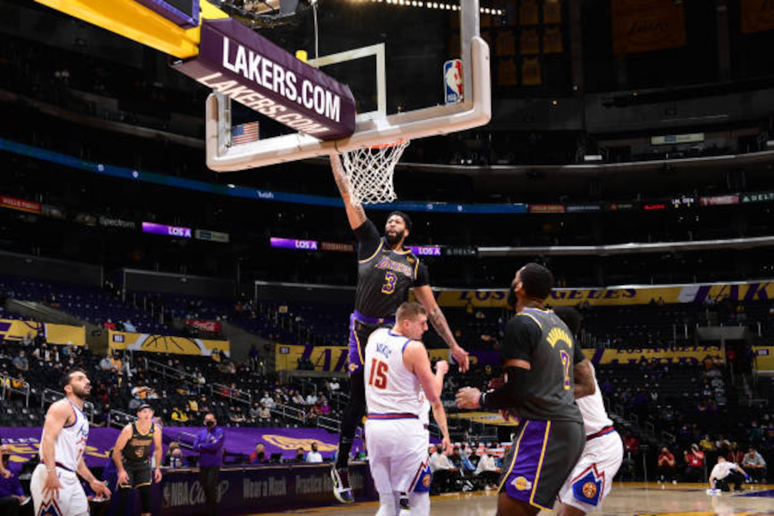 LOS ANGELES, CA - MAY 3: Anthony Davis #3 of the Los Angeles Lakers dunks the ball during the game against the Denver Nuggets on May 3, 2021 at STAPLES Center in Los Angeles, California. NOTE TO USER: User expressly acknowledges and agrees that, by downloading and/or using this Photograph, user is consenting to the terms and conditions of the Getty Images License Agreement. Mandatory Copyright Notice: Copyright 2021 NBAE (Photo by Adam Pantozzi/NBAE via Getty Images)