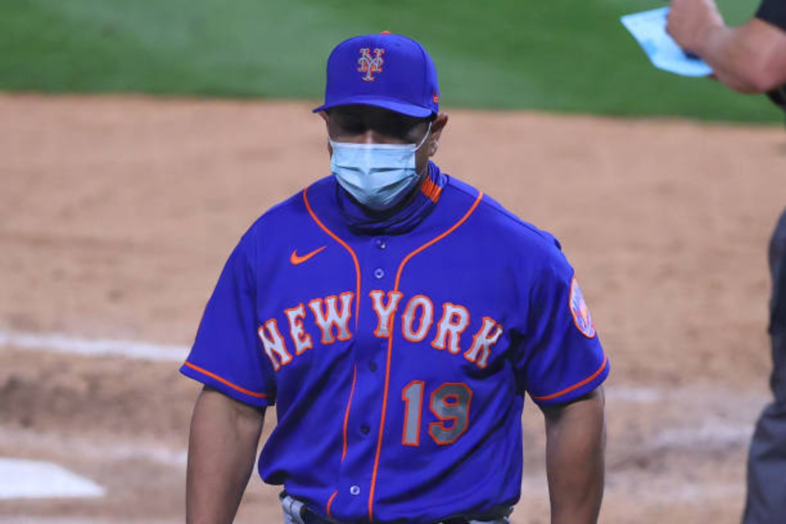 PHILADELPHIA, PA - MAY 01:  New York Mets manager Luis Rojas (19) walks back to the dugout during the Major League Baseball game between the Philadelphia Phillies and the New York Mets on May 1, 2021 at Citizens Bank Park in Philadelphia, PA.  (Photo by Rich Graessle/Icon Sportswire via Getty Images)