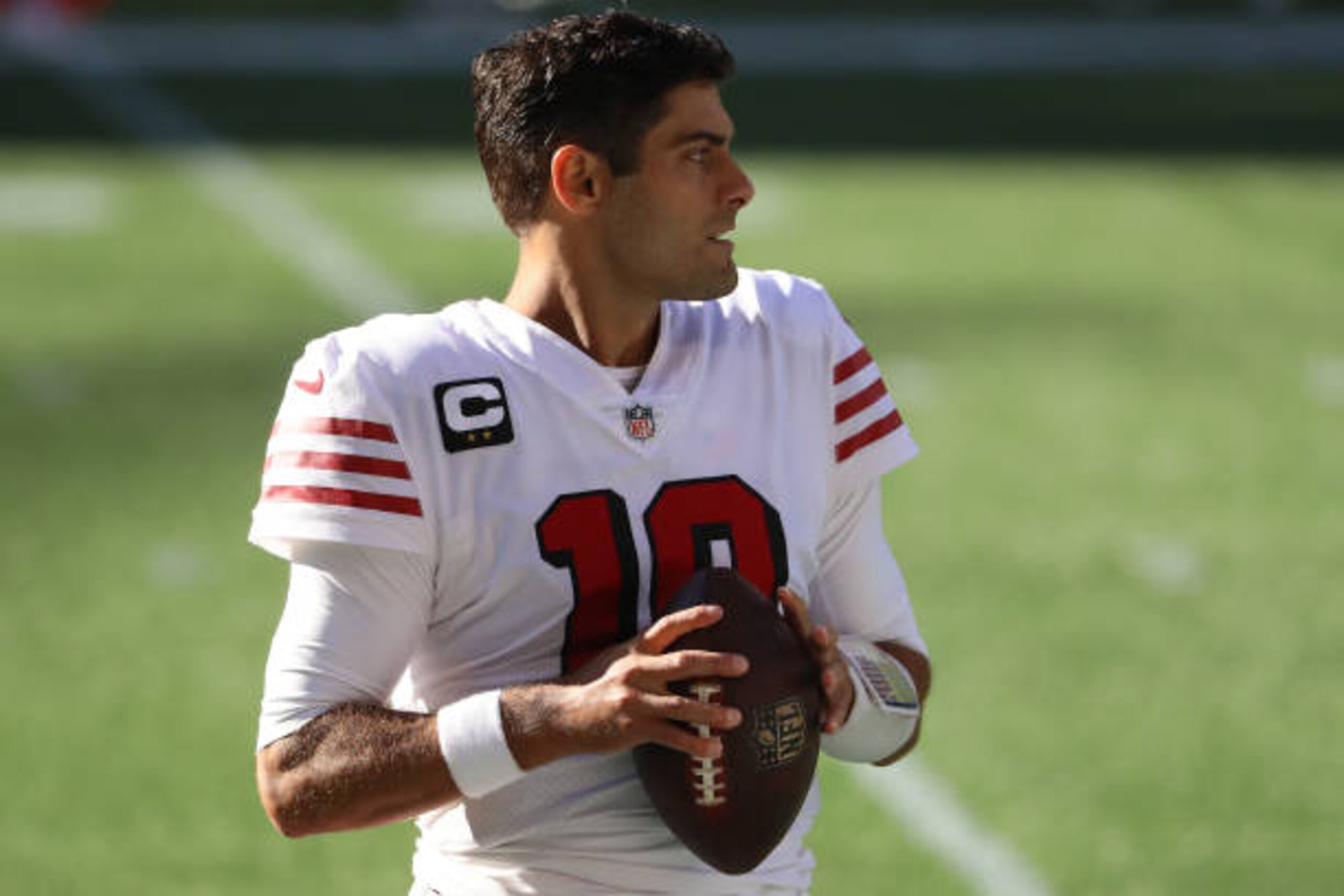 SEATTLE, WASHINGTON - NOVEMBER 01: Jimmy Garoppolo #10 of the San Francisco 49ers warms up before their game against the Seattle Seahawks at CenturyLink Field on November 01, 2020 in Seattle, Washington. (Photo by Abbie Parr/Getty Images)