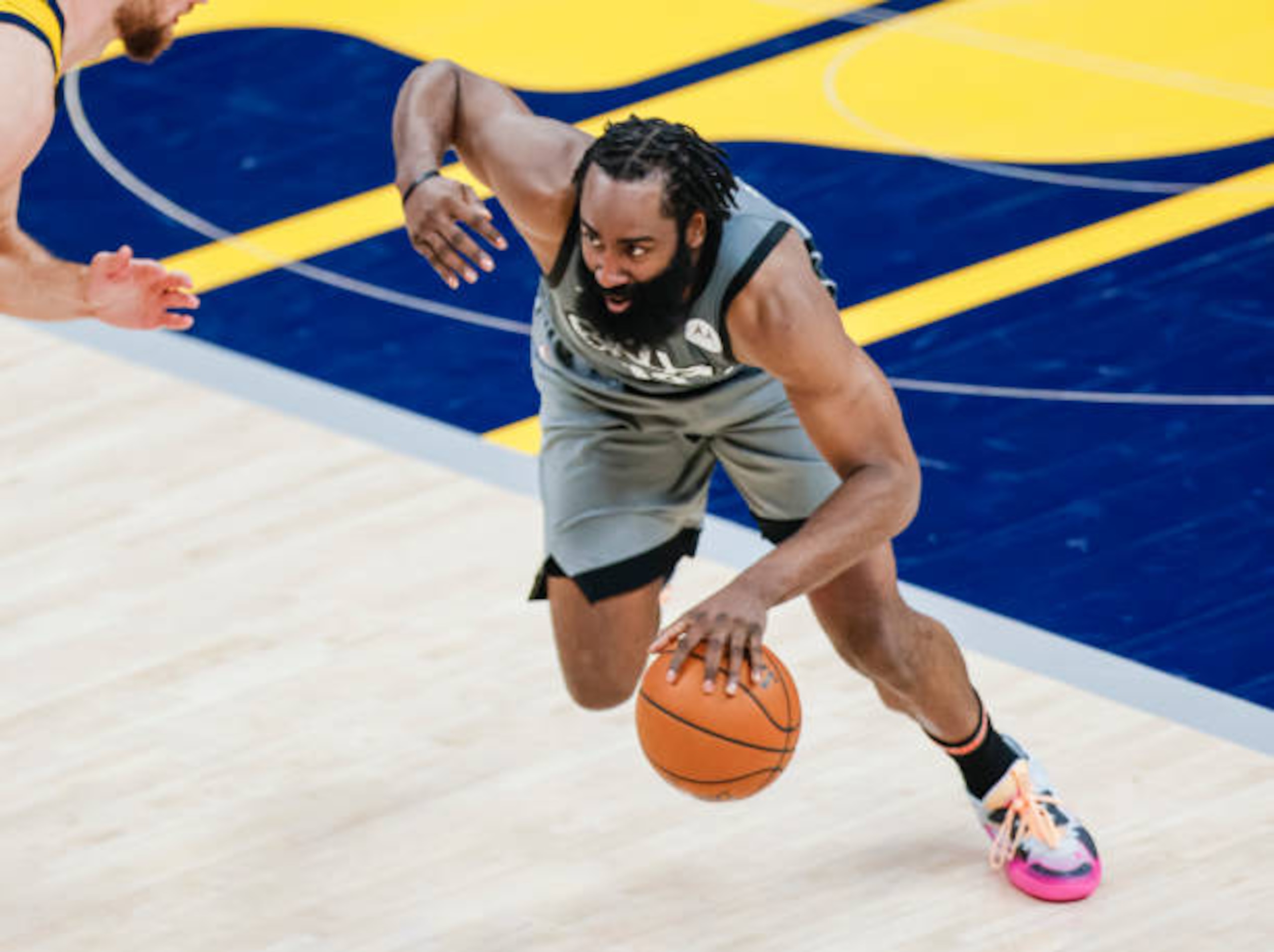 INDIANAPOLIS, IN - MARCH 17: James Harden #13 of the Brooklyn Nets dribbles the ball against the Indiana Pacers at Bankers Life Fieldhouse on March 17, 2021 in Indianapolis, Indiana. NOTE TO USER: User expressly acknowledges and agrees that, by downloading and or using this photograph, User is consenting to the terms and conditions of the Getty Images License Agreement.  (Photo by Michael Hickey/Getty Images)