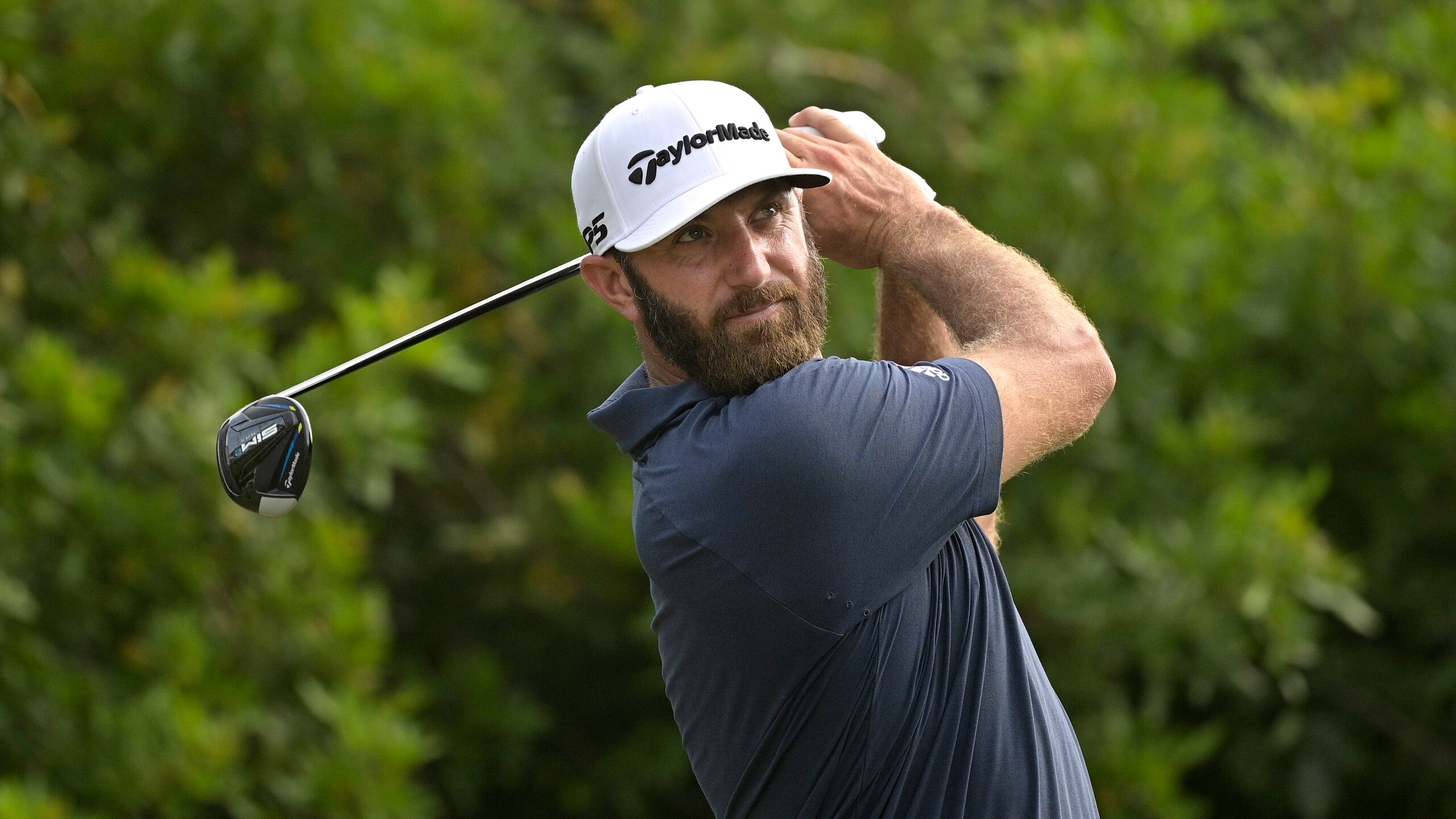 Dustin Johnson watches his tee shot on the seventh hole during the final round of the Valspar Championship golf tournament, Sunday, May 2, 2021, in Palm Harbor, Fla. (AP Photo/Phelan M. Ebenhack) Dustin Johnson watches his tee shot on the seventh hole during the final round of the Valspar Championship golf tournament, Sunday, May 2, 2021, in Palm Harbor, Fla. (AP Photo/Phelan M. Ebenhack)