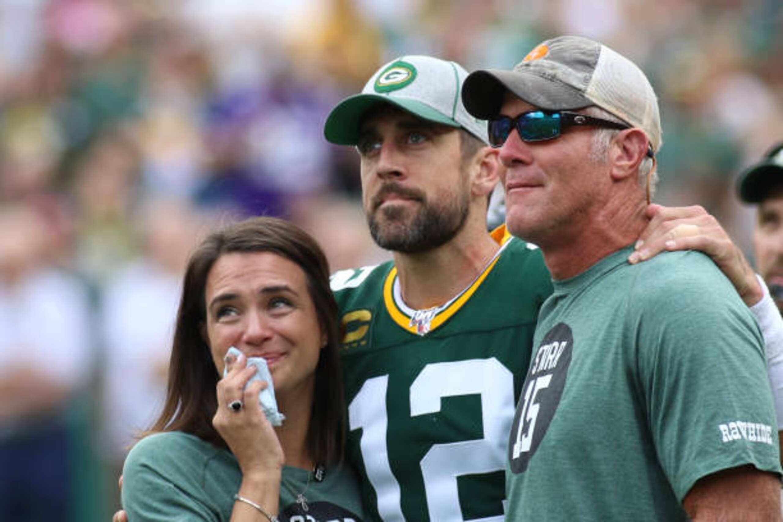 GREEN BAY, WI - SEPTEMBER 15: Green Bay Packers quarterback Aaron Rodgers (12) watches a tribute to Bart Starr with Leann Nelson and Brett Favre during a game between the Green Bay Packers and the Minnesota Vikings on September 15, 2019 at Lambeau Field in Green Bay, WI. (Photo by Larry Radloff/Icon Sportswire via Getty Images) GREEN BAY, WI - SEPTEMBER 15: Green Bay Packers quarterback Aaron Rodgers (12) watches a tribute to Bart Starr with Leann Nelson and Brett Favre during a game between the Green Bay Packers and the Minnesota Vikings on September 15, 2019 at Lambeau Field in Green Bay, WI. (Photo by Larry Radloff/Icon Sportswire via Getty Images)