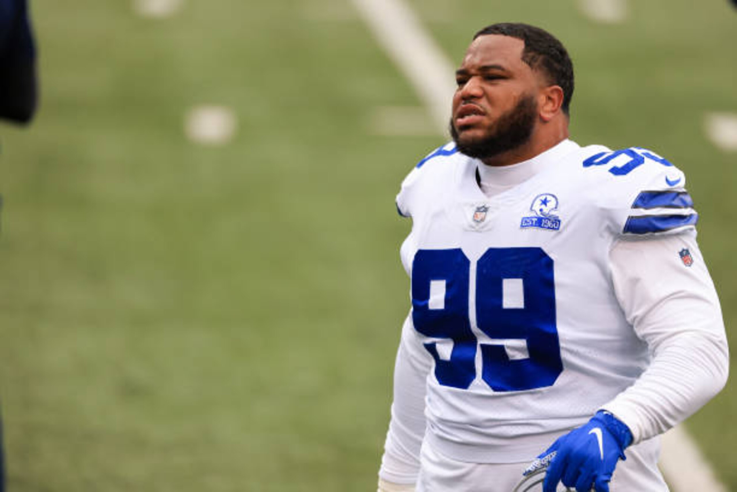 CINCINNATI, OH - DECEMBER 13: Dallas Cowboys defensive tackle Antwaun Woods (99) warms up before the game against the Dallas Cowboys and the Cincinnati Bengals on December 13, 2020, at Paul Brown Stadium in Cincinnati, OH. (Photo by Ian Johnson/Icon Sportswire via Getty Images)