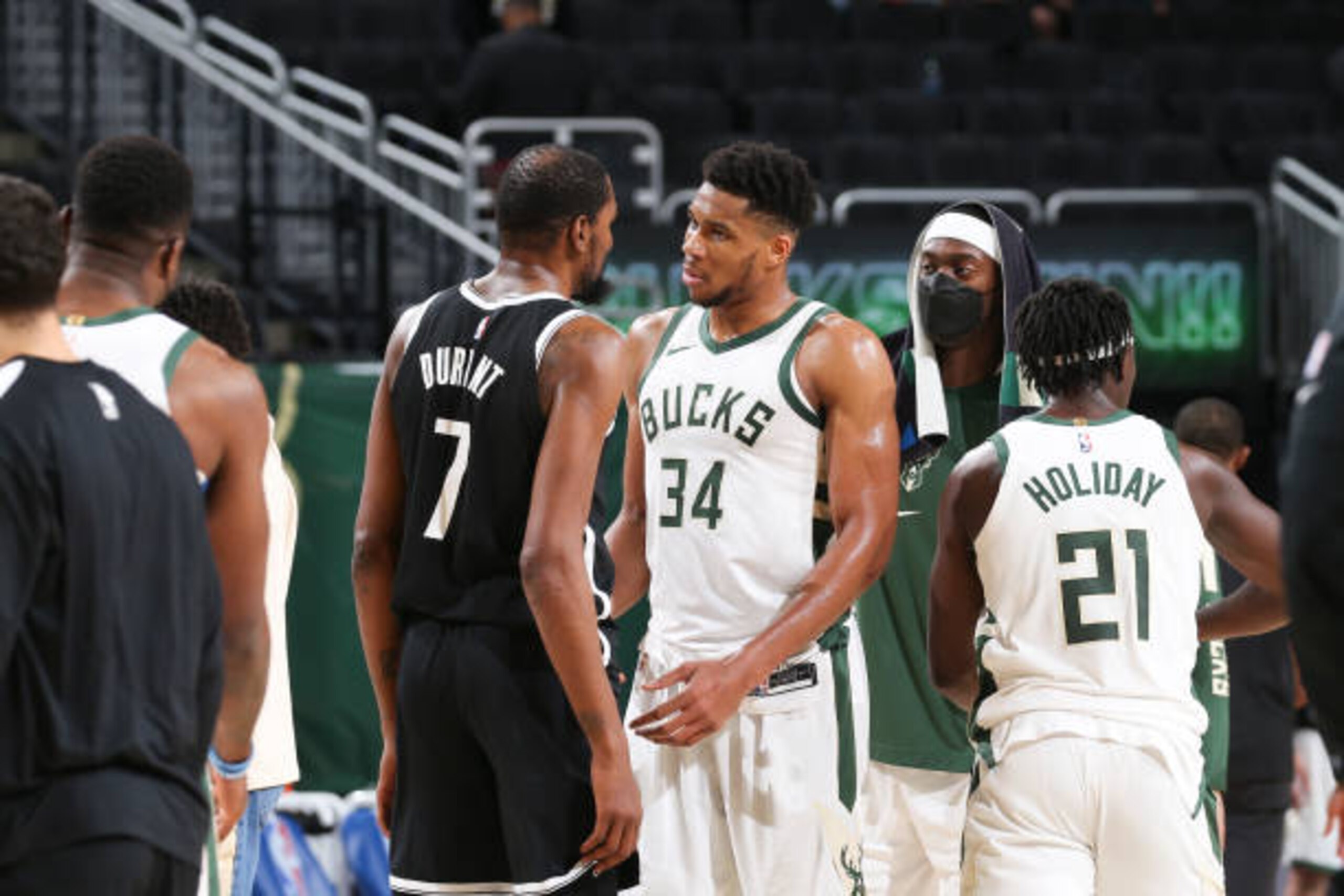 MILWAUKEE, WI - MAY 4: Kevin Durant #7 of the Brooklyn Nets talks to Giannis Antetokounmpo #34 of the Milwaukee Bucks after the game on May 4, 2021 at the Fiserv Forum Center in Milwaukee, Wisconsin. NOTE TO USER: User expressly acknowledges and agrees that, by downloading and or using this Photograph, user is consenting to the terms and conditions of the Getty Images License Agreement. Mandatory Copyright Notice: Copyright 2021 NBAE (Photo by Gary Dineen/NBAE via Getty Images).